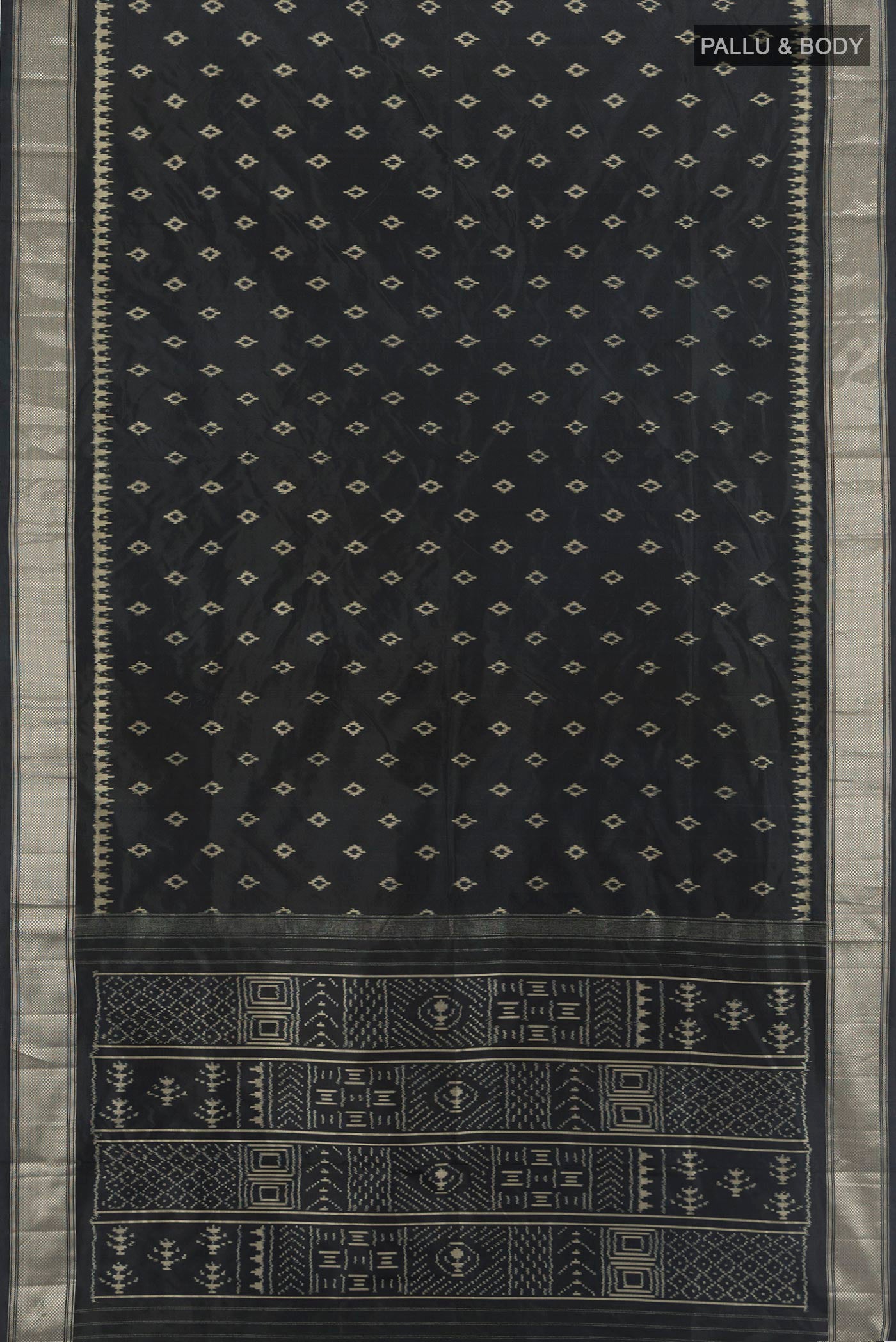 Flat view of Black Pochampally Silk Saree with Pure Ikat on the body and Zari Border. 