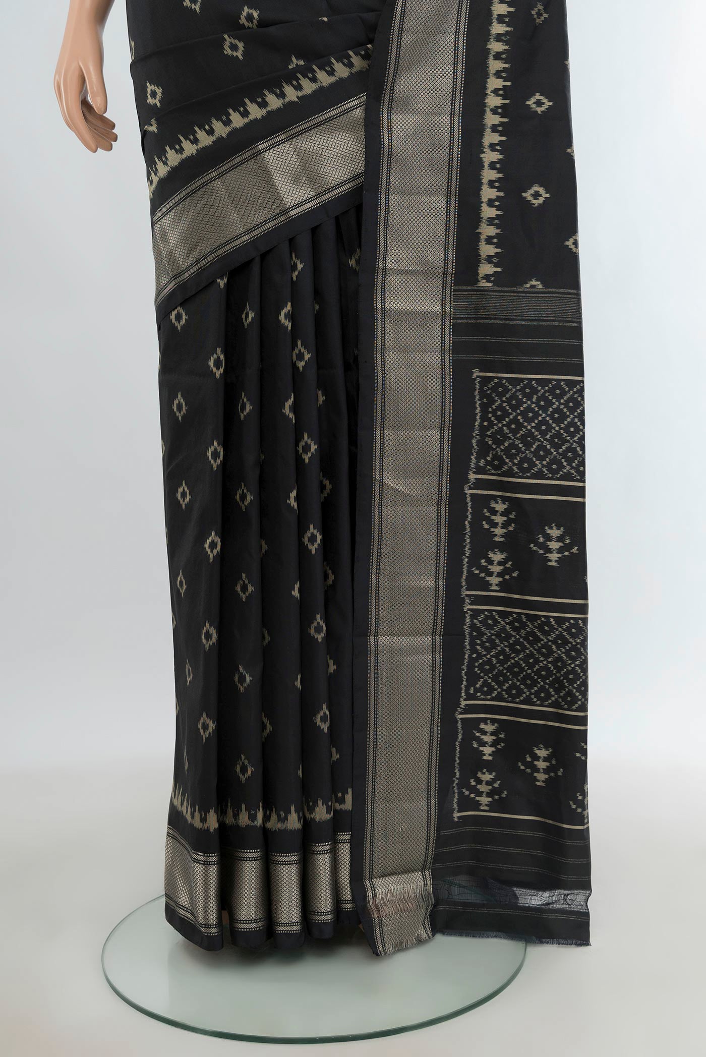 Pleats and pallu of Black Pochampally Silk Saree with Pure Ikat on the body and Zari Border. 