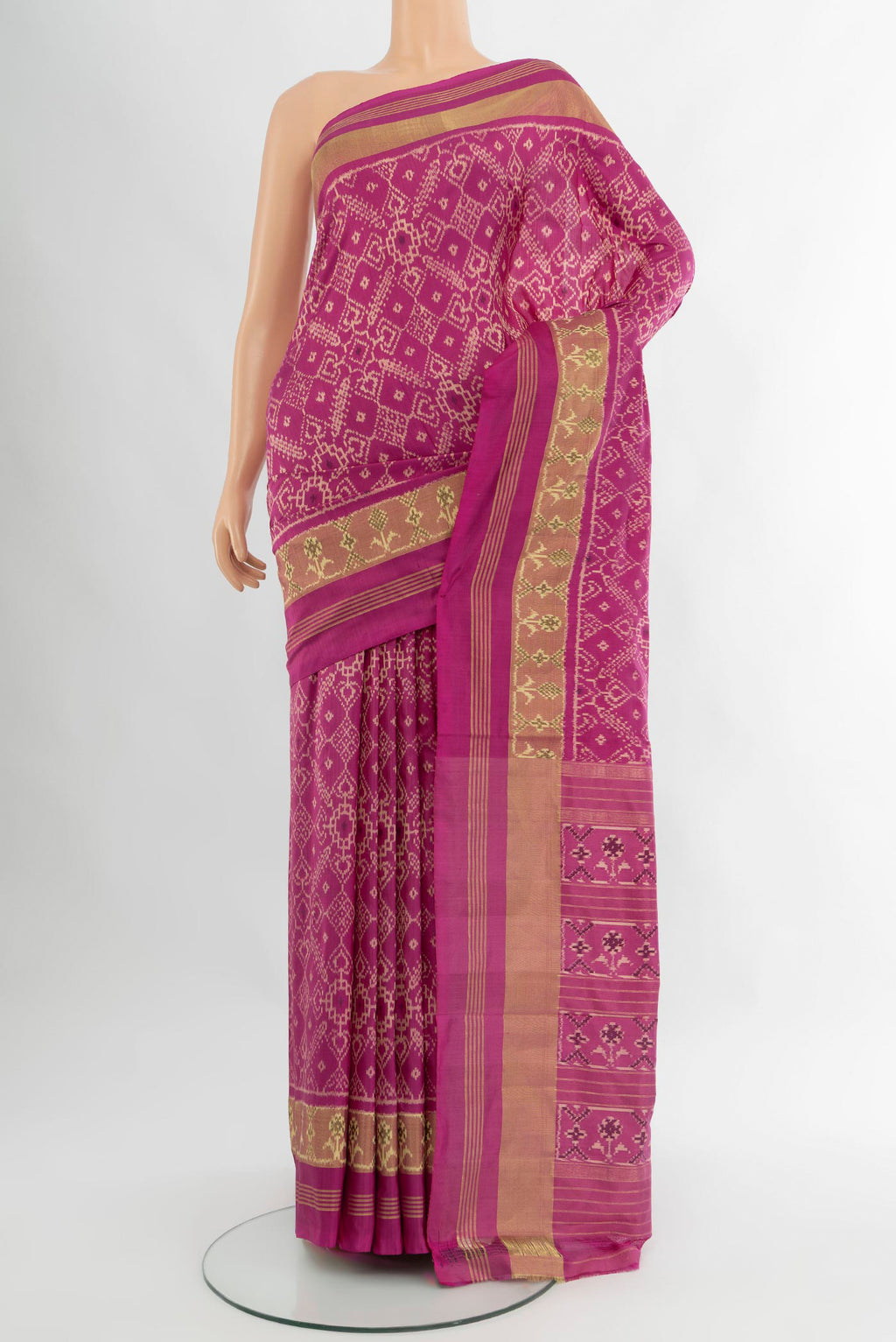 Pink Pochampally Silk Saree with Pure Ikat on the body and Ikat Border.  displayed on a mannequin