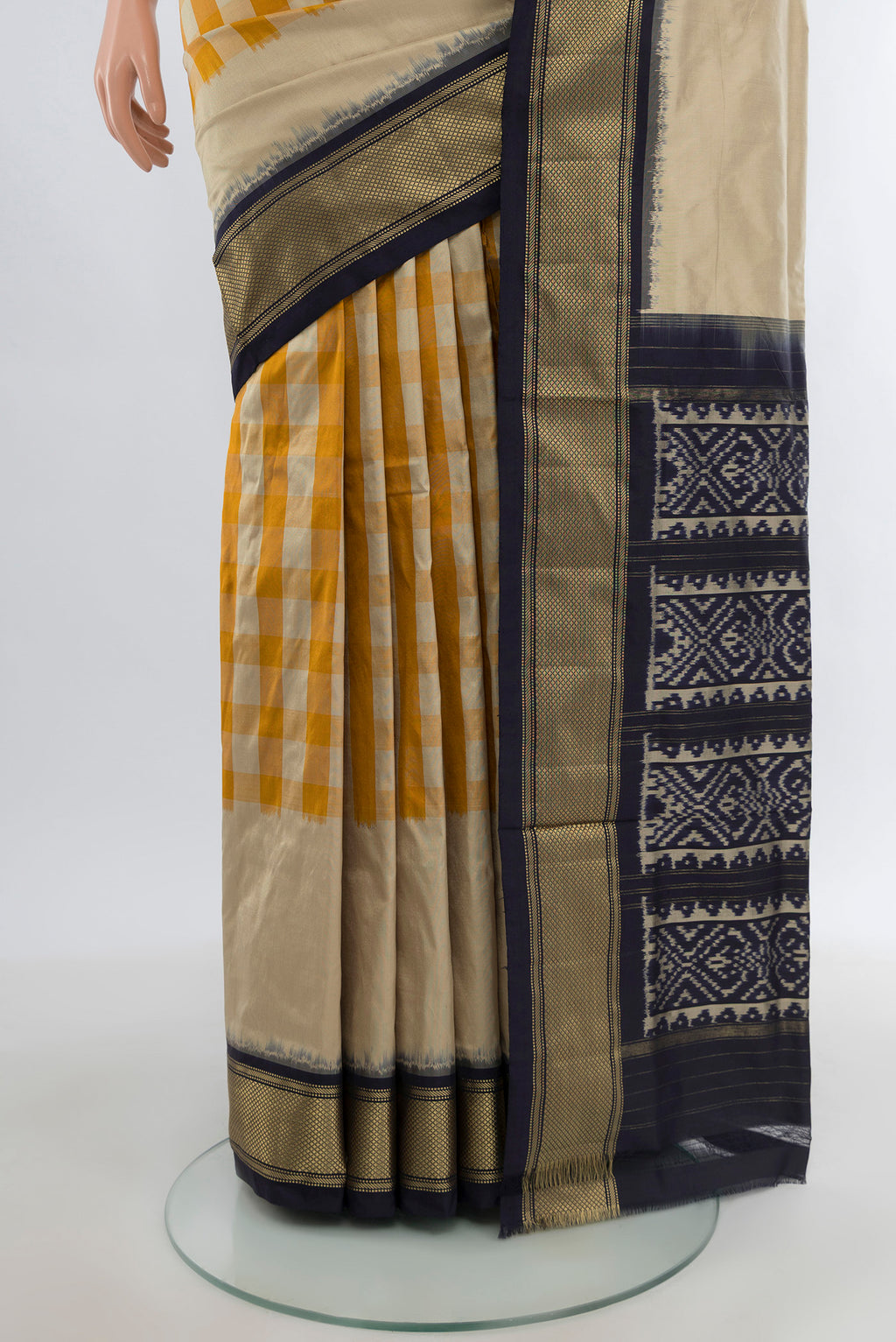Pleats and pallu of Multi Color Pochampally Silk Saree with Checked design on the body and Zari Border. 