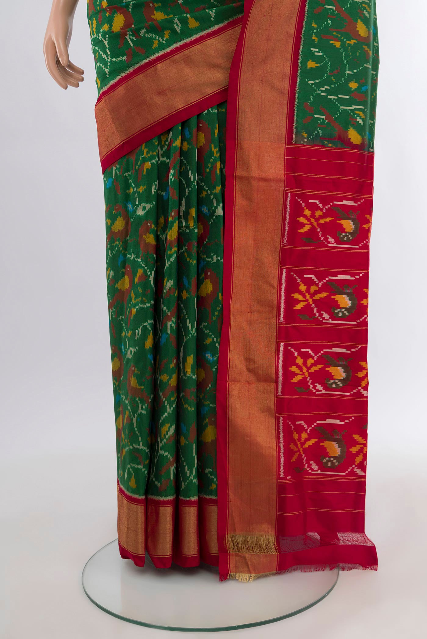 Pleats and pallu of Green Pochampally Silk Saree with Ikat design on the body and Zari Border. 
