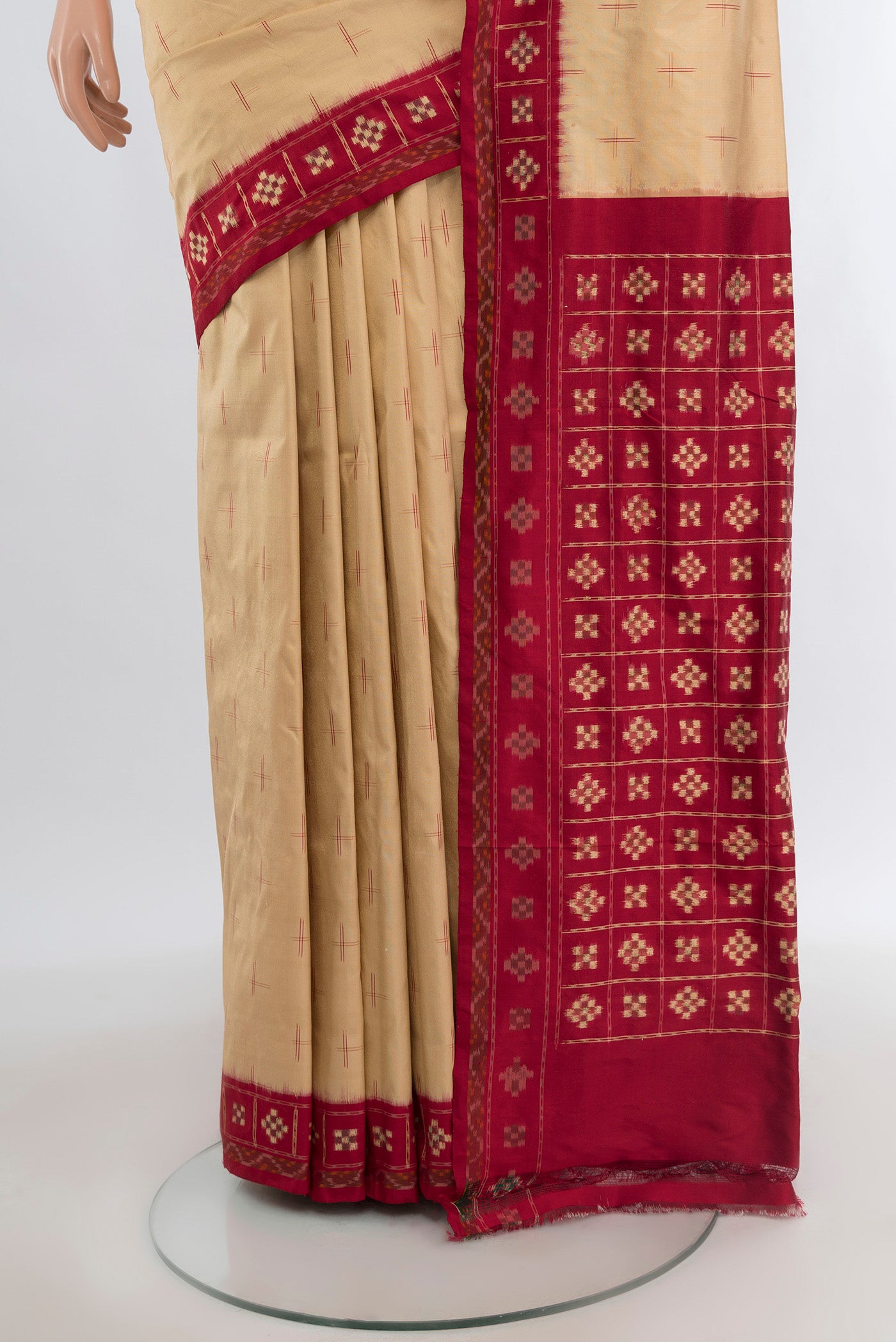 Pleats and pallu of Sandal Pochampally Silk Saree with Pure Ikat on the body and Ikat Border. 