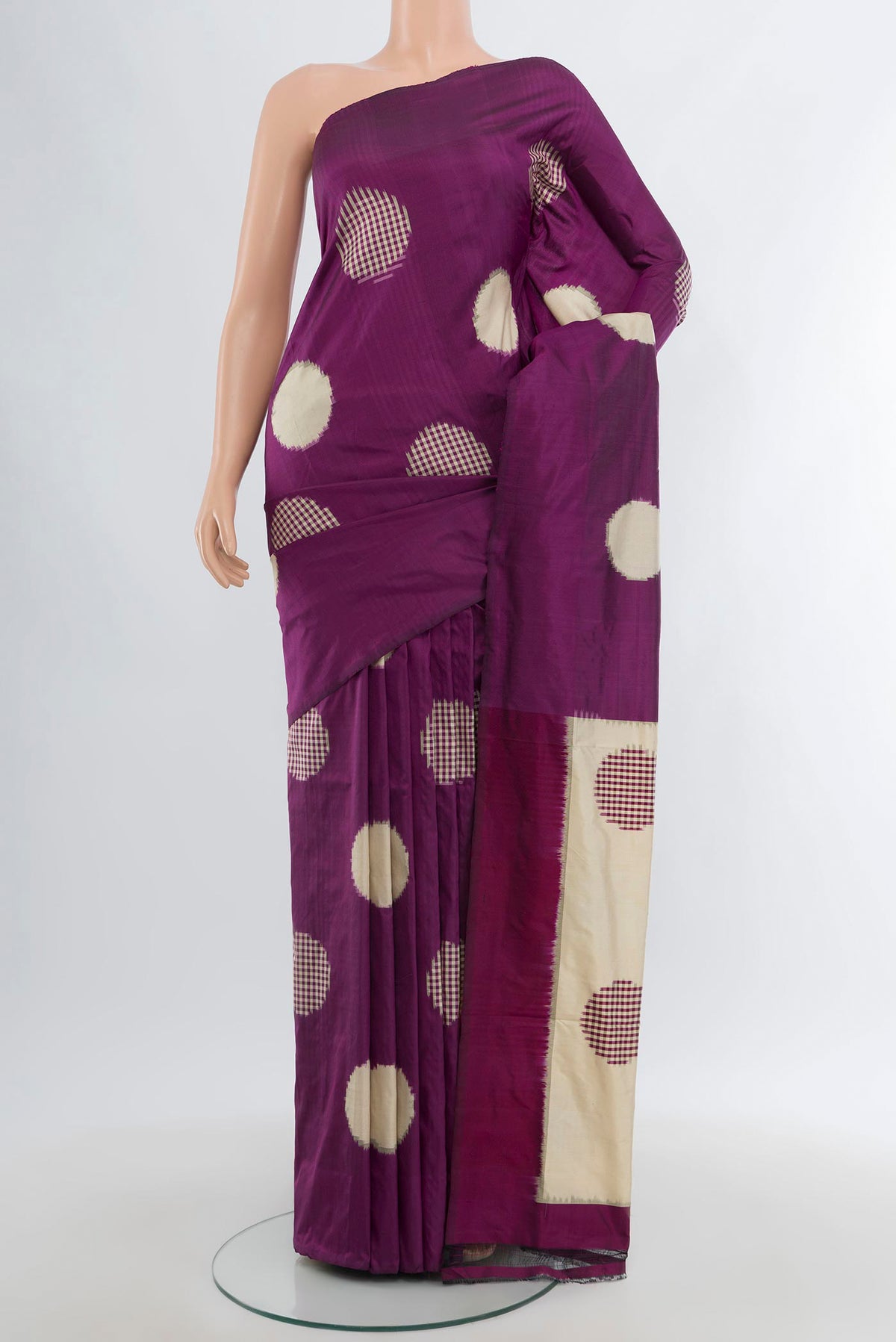 Purple Pochampally Silk Saree with Pure Ikat on the body and Without Border.  displayed on a mannequin