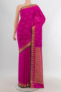 Rani Pink Kanjivaram Silk Saree with Zari Butta on the body and Zari Border.  displayed on a mannequin
