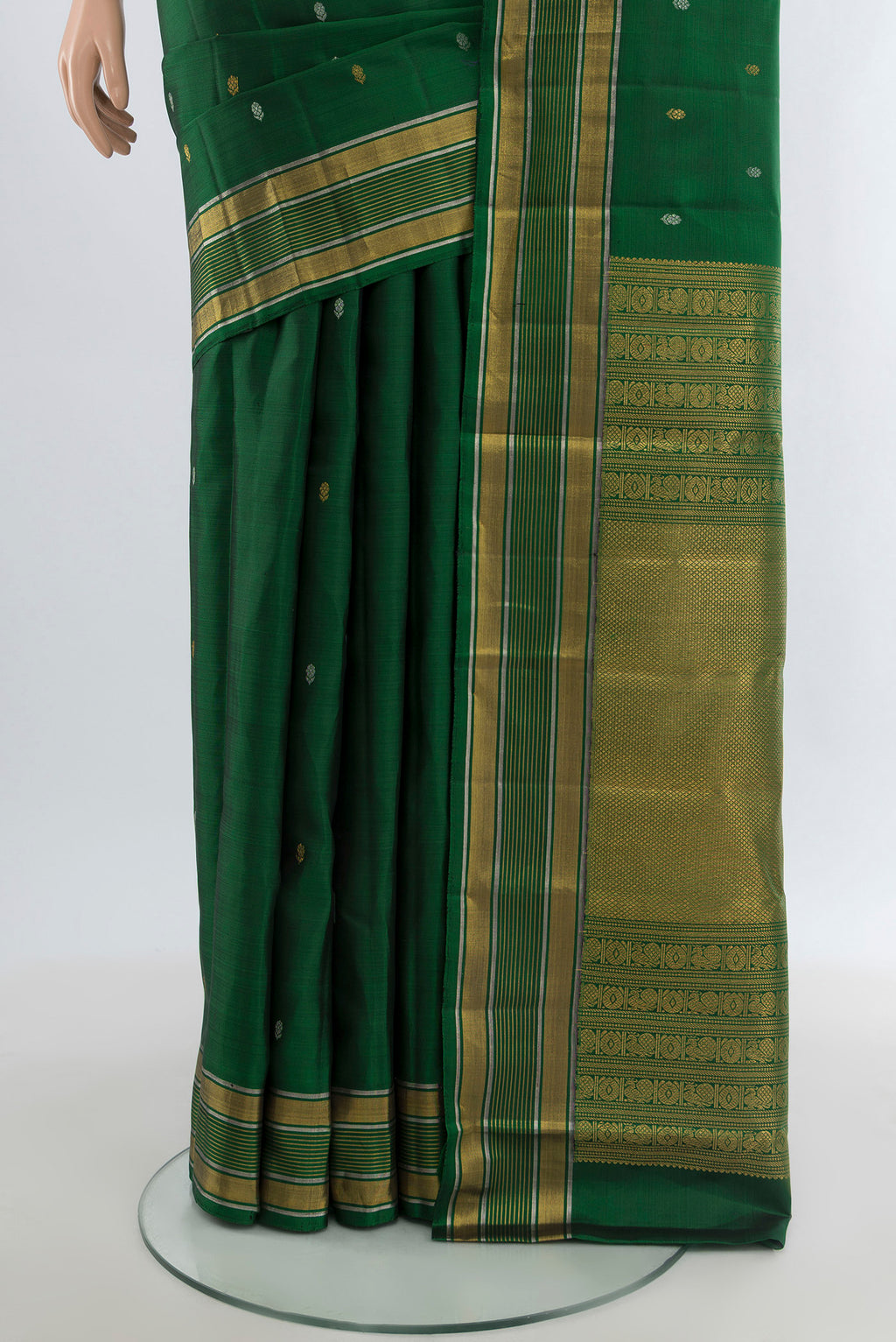 Pleats and pallu of Bottle Green Kanjivaram Silk Saree with Zari Butta on the body and Zari Border. 