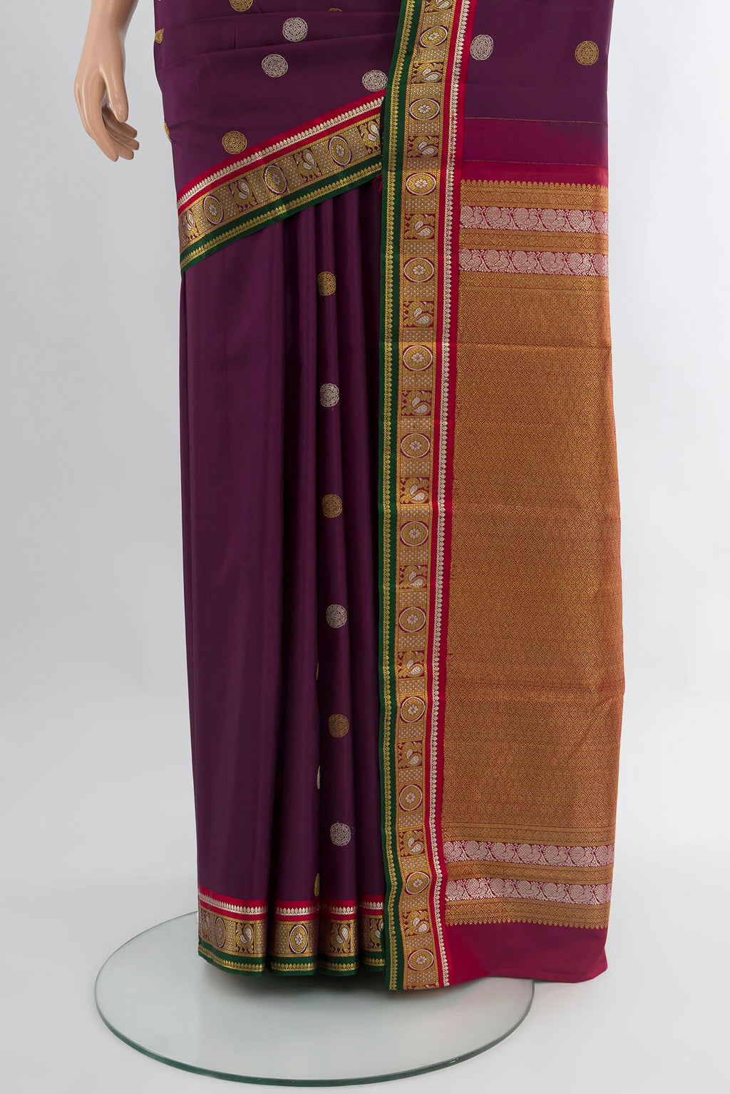 Pleats and pallu of Purple Kanjivaram Silk Saree with Zari Butta on the body and Zari Border. 