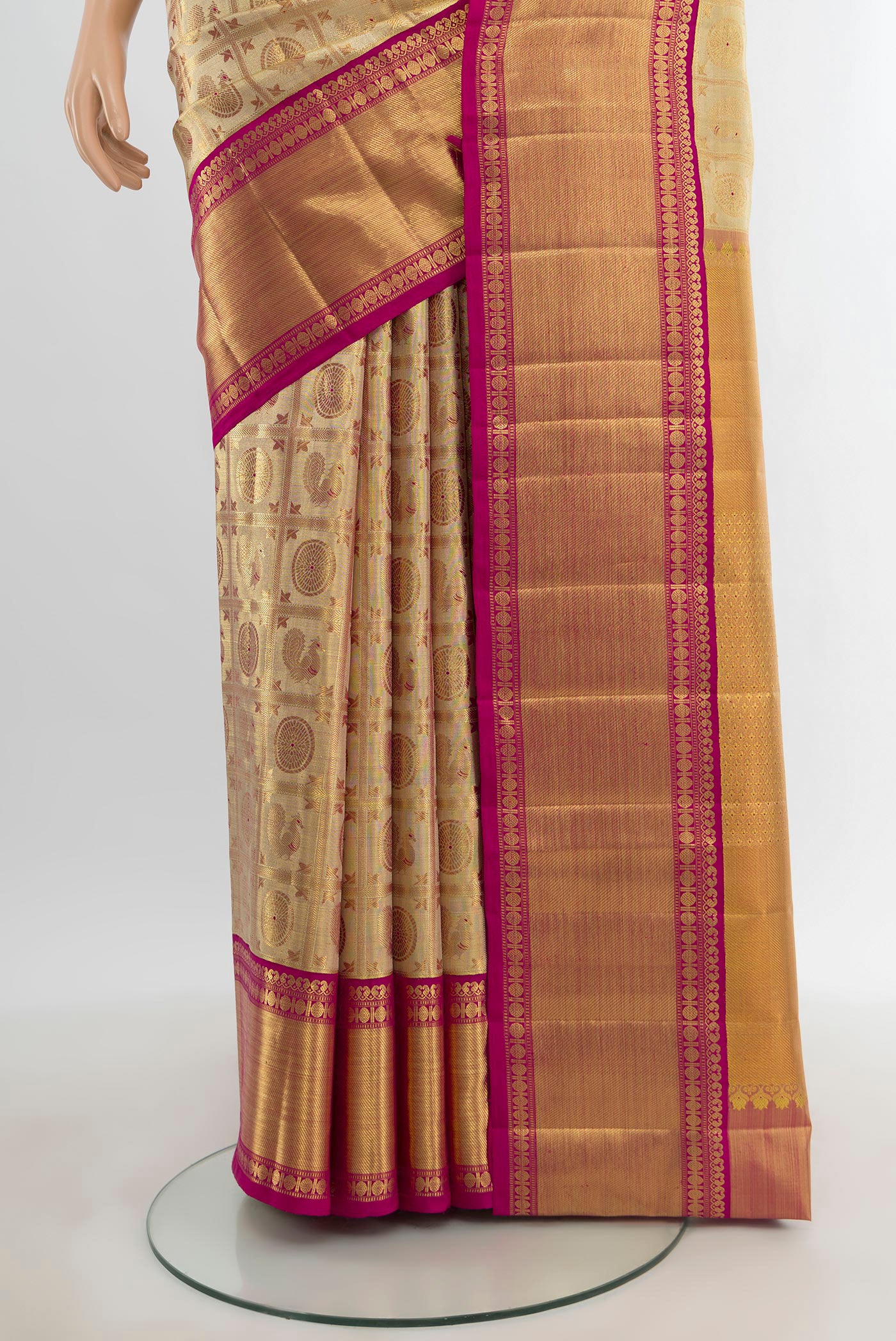 Pleats and pallu of Golden Kanjivaram Tissue Silk Saree with Zari Brocade on the body and Zari Border. 