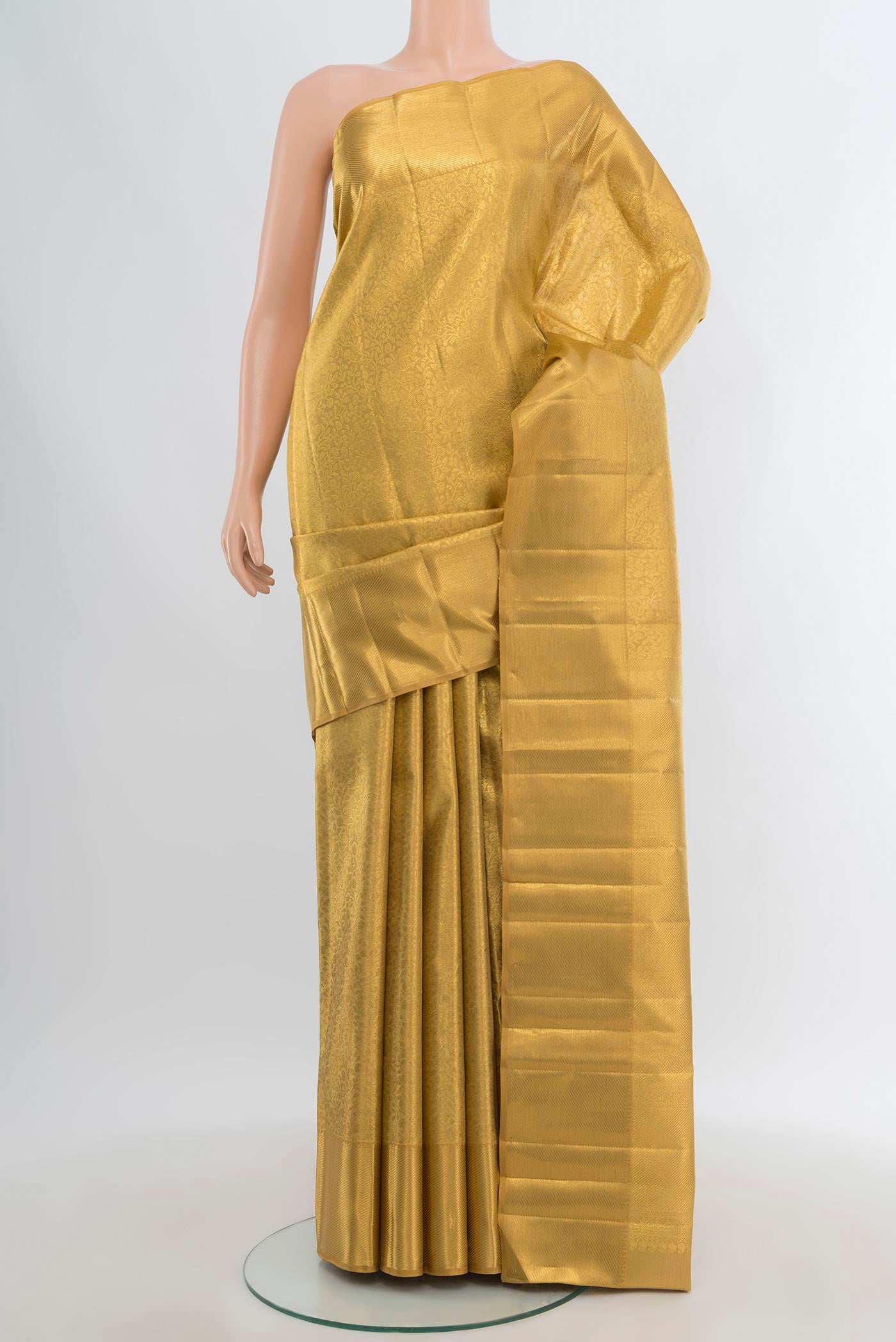 Pure Silk Pure Zari Golden Kanjivaram Tissue Saree with Zari Brocade on the body and Zari Border.  displayed on a mannequin