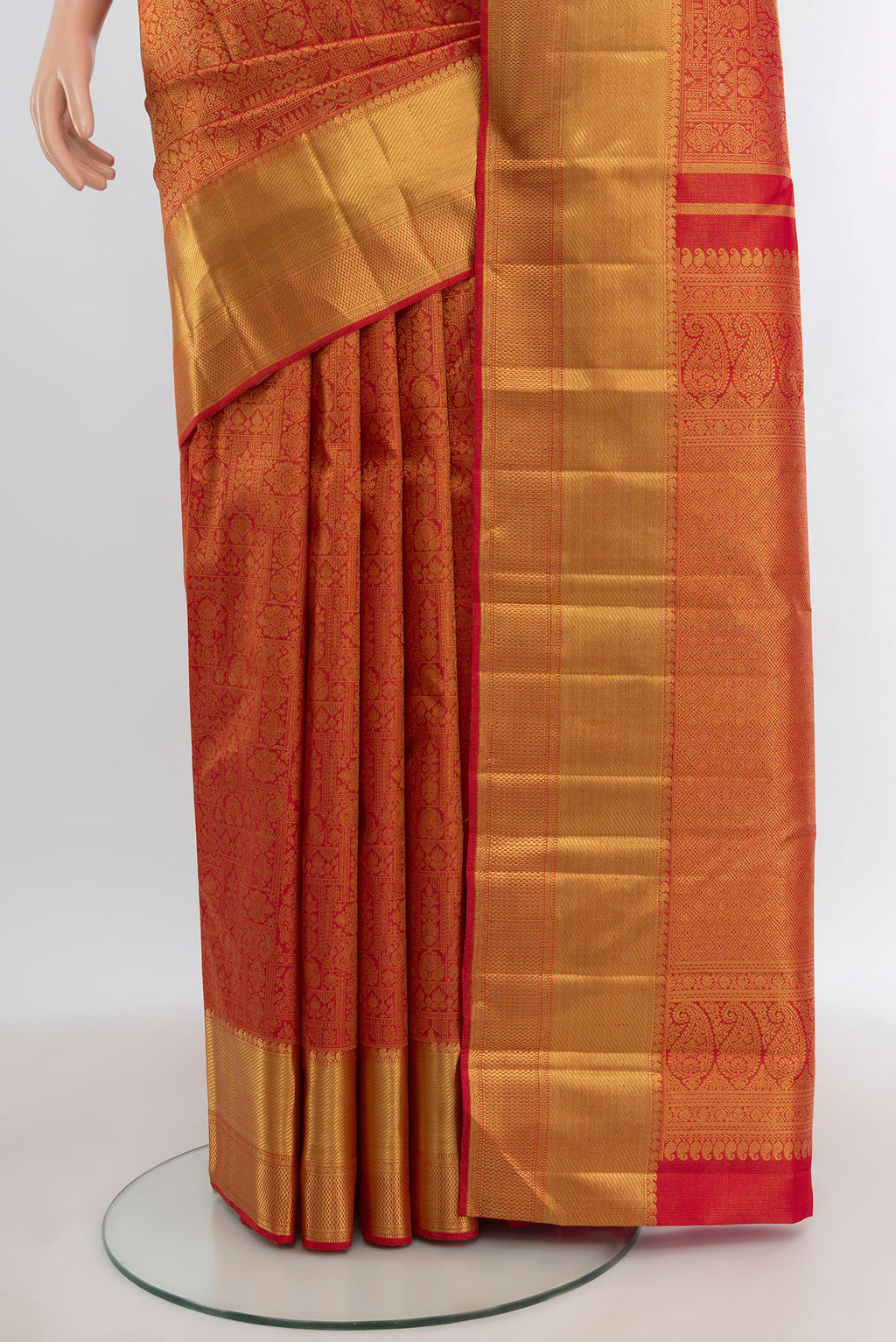 Pleats and pallu of Pure Silk Pure Zari Brick Orange Kanjivaram Tissue Saree with Zari Brocade on the body and Zari Border. 