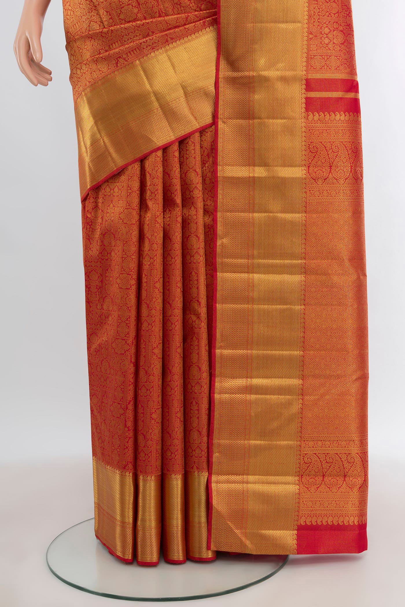 Pleats and pallu of Pure Silk Pure Zari Brick Orange Kanjivaram Tissue Saree with Zari Brocade on the body and Zari Border. 