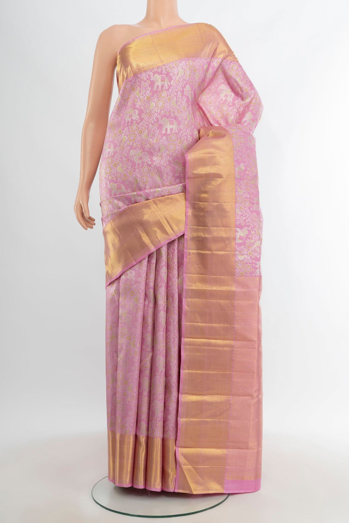 Pure Silk Pure Zari Rose pink Kanjivaram Saree with Zari Brocade on the body and Zari Border.  displayed on a mannequin