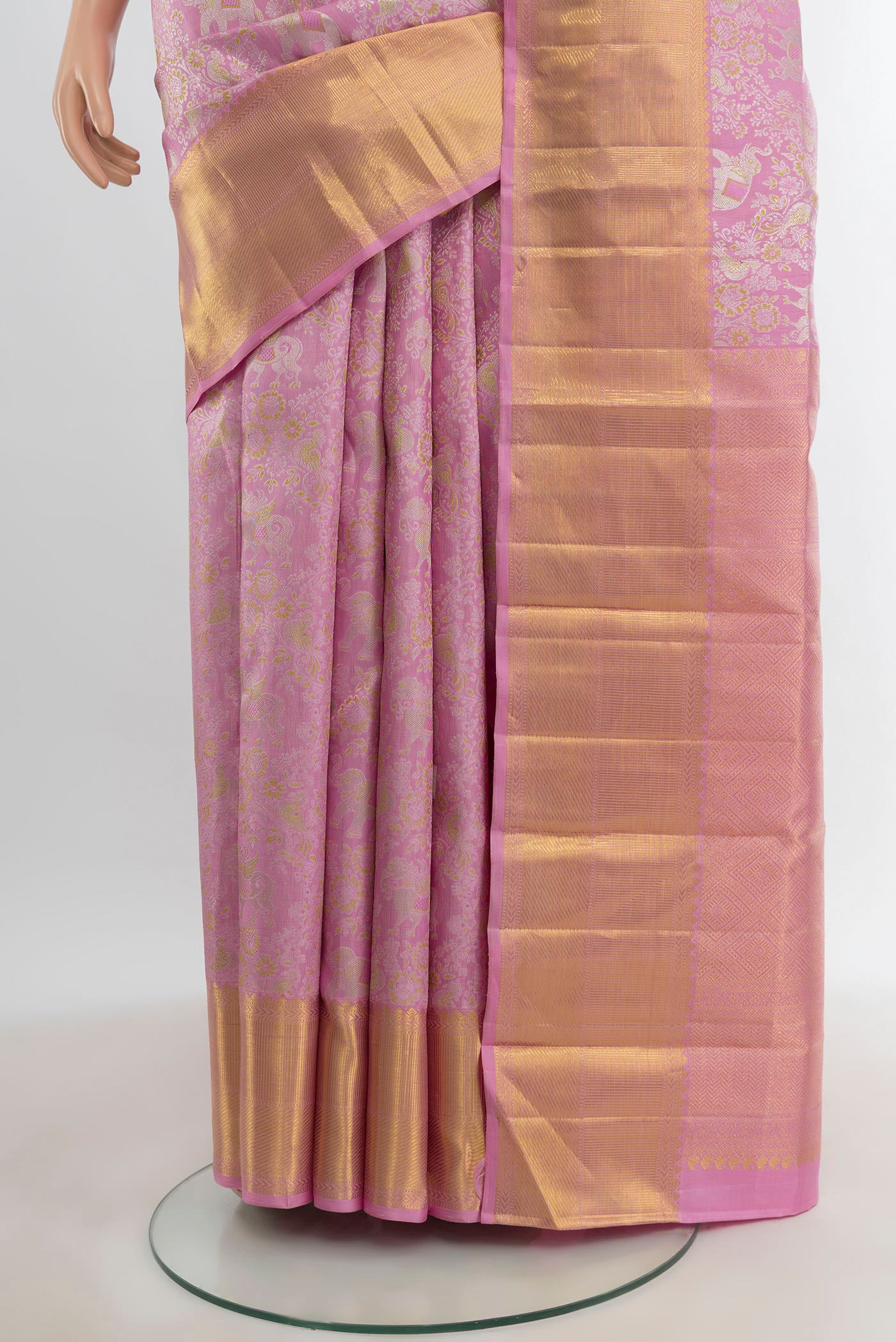 Pleats and pallu of Pure Silk Pure Zari Rose pink Kanjivaram Saree with Zari Brocade on the body and Zari Border. 