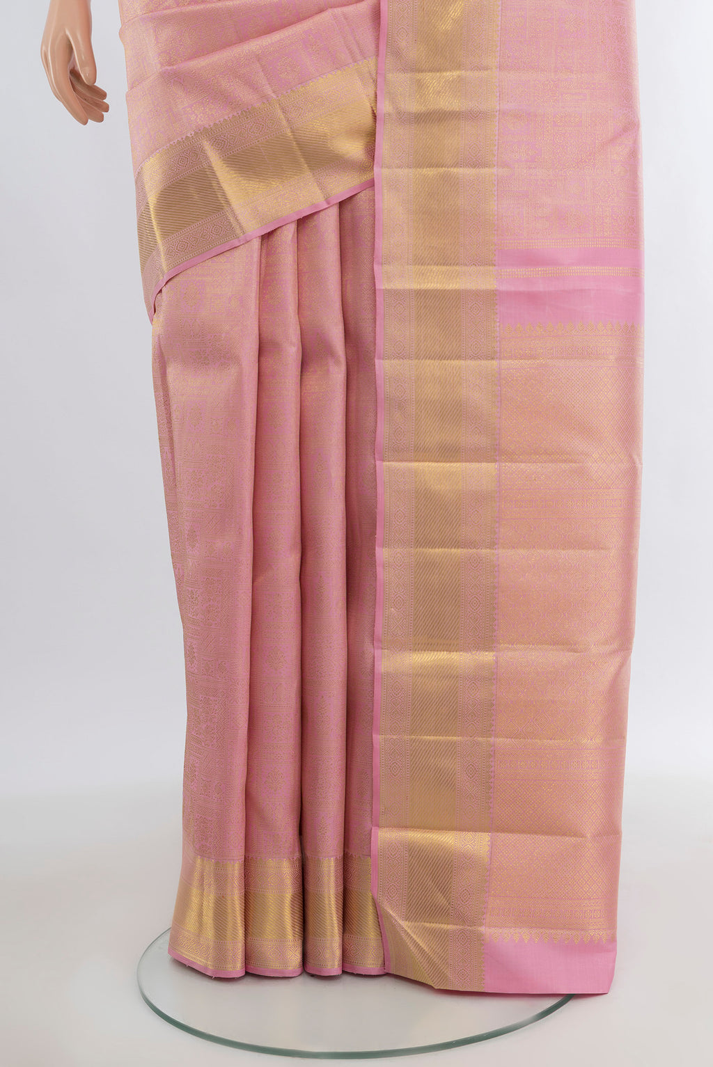 Pleats and pallu of Pure Silk Pure Zari Rose Gold Kanjivaram Saree with Zari Brocade on the body and Zari Border. 