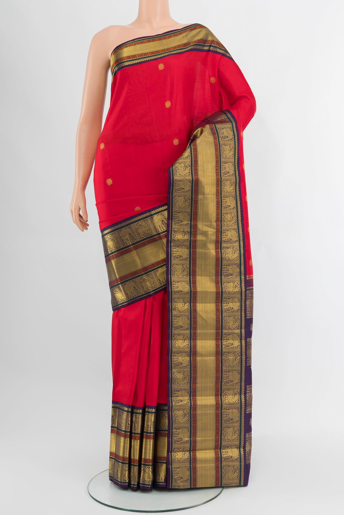 Pure Silk Pure Zari Red Kanjivaram Saree with Zari Butta on the body and Zari Border.  displayed on a mannequin