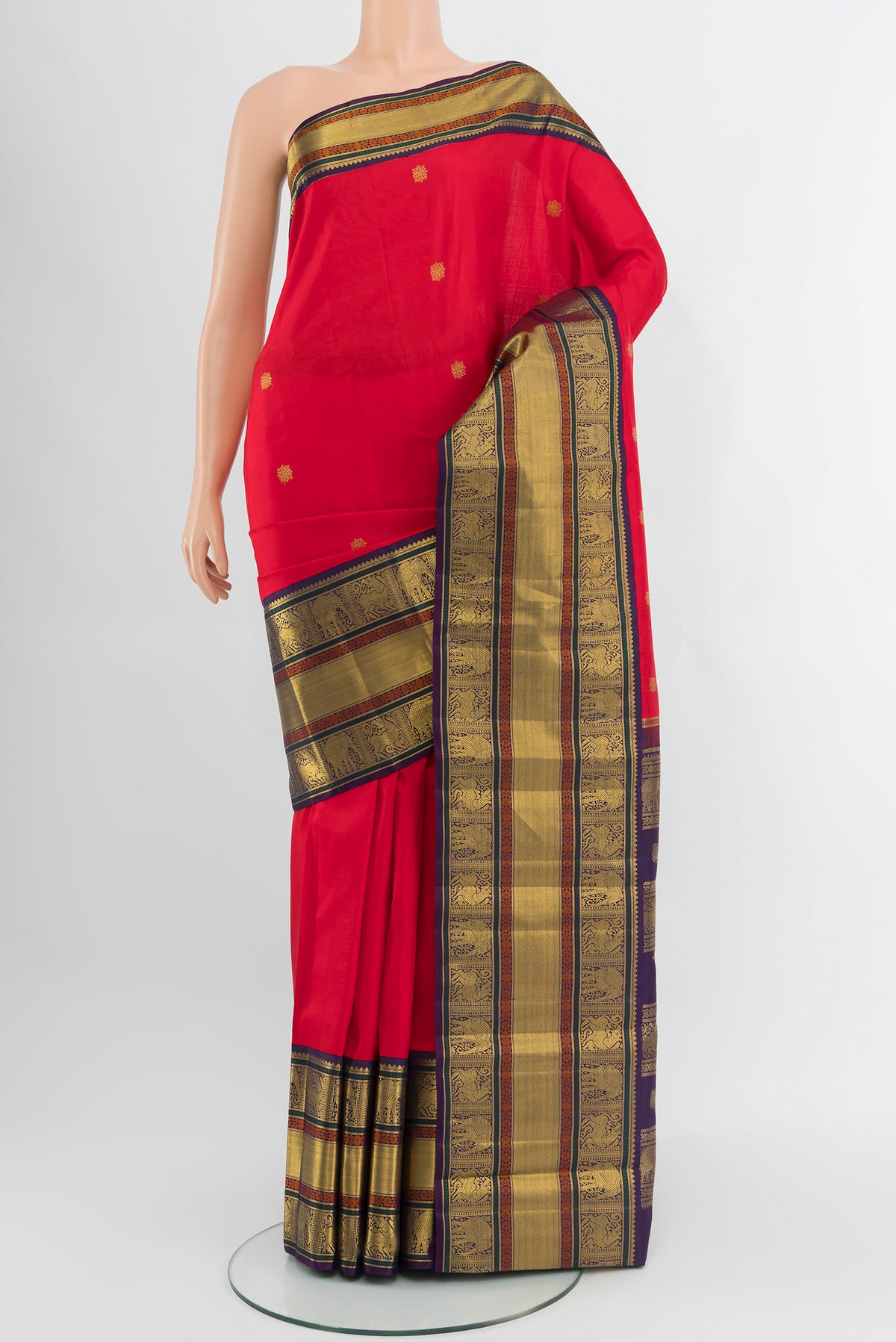 Pure Silk Pure Zari Red Kanjivaram Saree with Zari Butta on the body and Zari Border.  displayed on a mannequin