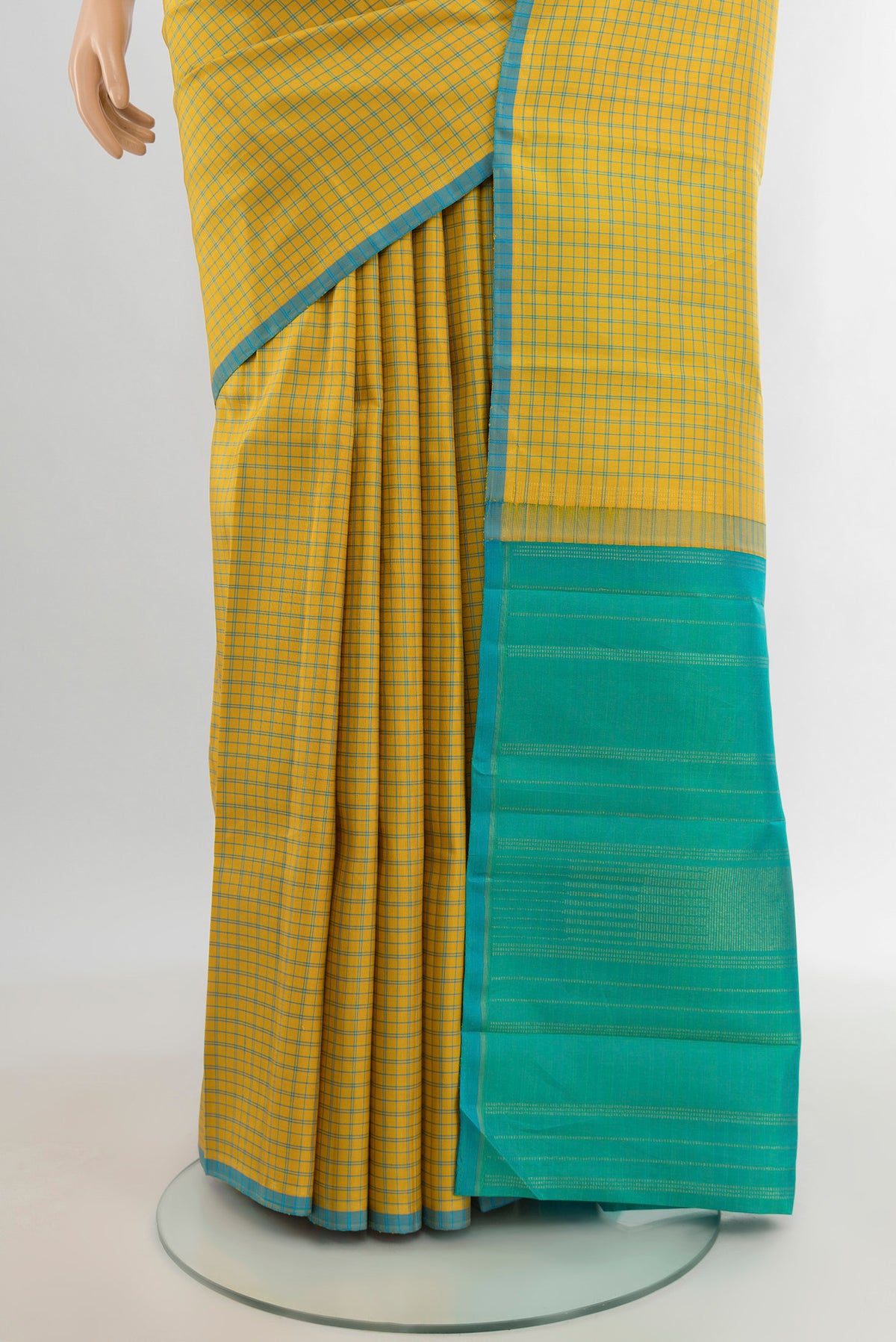Pleats and pallu of Pure Silk Pure Zari Yellow Kanjivaram Saree with Checked design on the body and Without Border. 