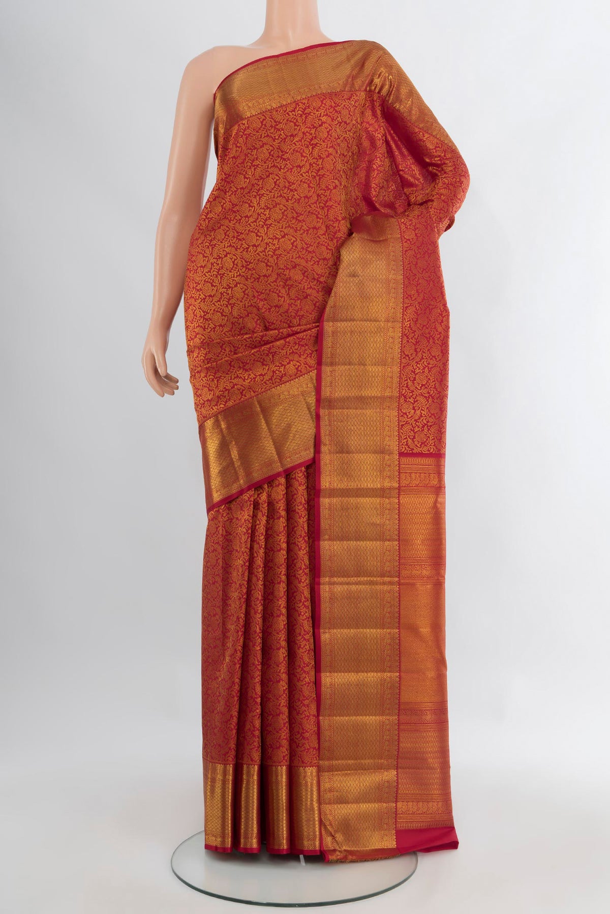 Pure Silk Pure Zari Maroon Kanjivaram Saree with Zari Brocade on the body and Zari Border.  displayed on a mannequin