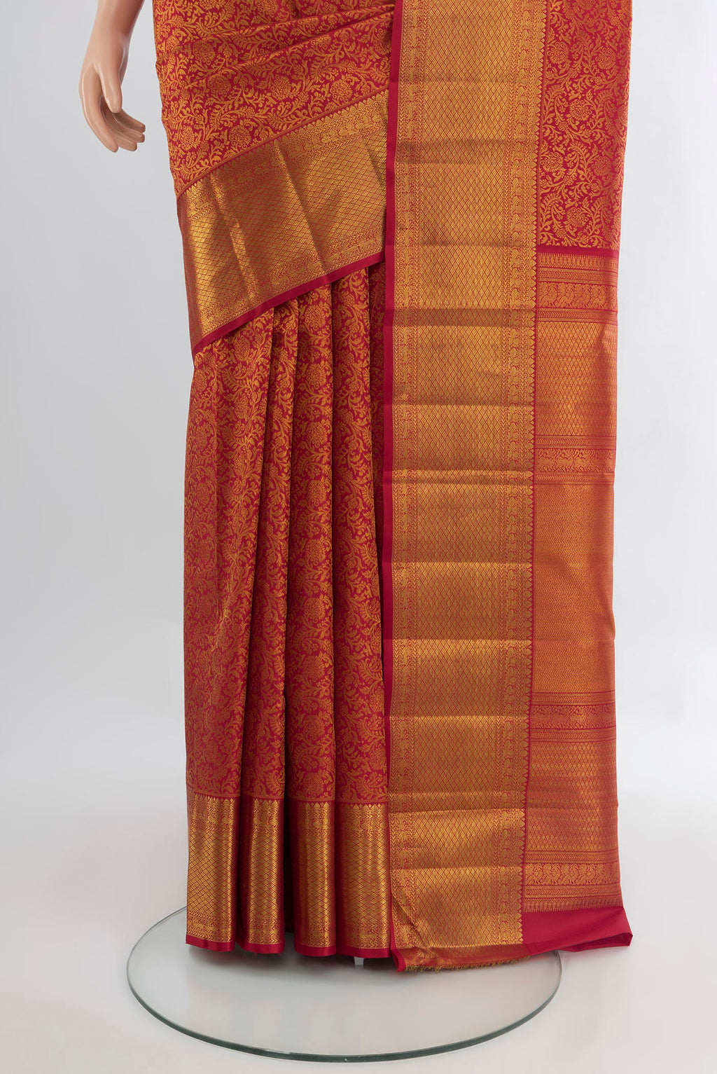 Pleats and pallu of Pure Silk Pure Zari Maroon Kanjivaram Saree with Zari Brocade on the body and Zari Border. 