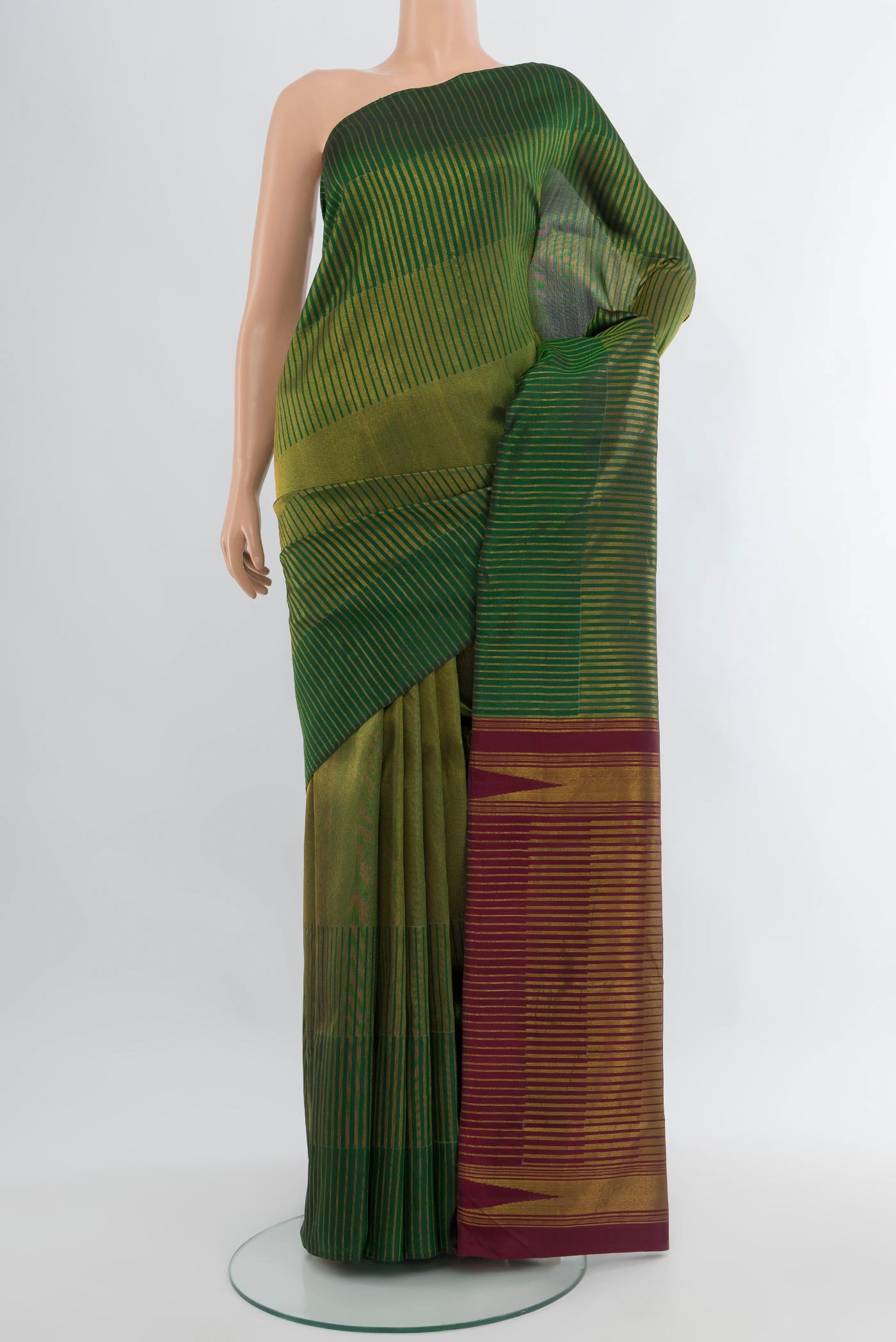 Bottle Green Kanchipuram Silk Saree with Stripes on the body and Without Border.  displayed on a mannequin