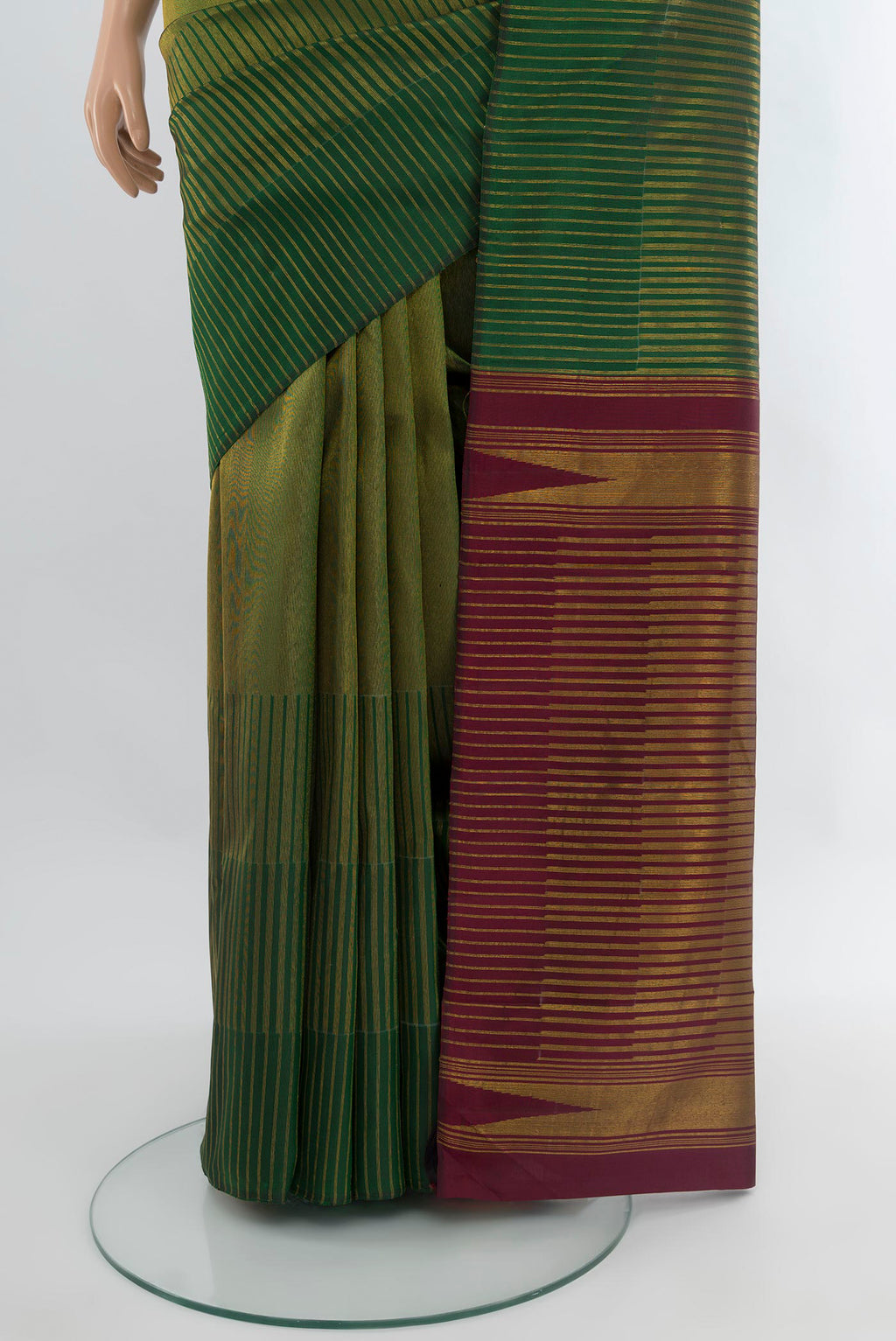 Pleats and pallu of Bottle Green Kanchipuram Silk Saree with Stripes on the body and Without Border. 