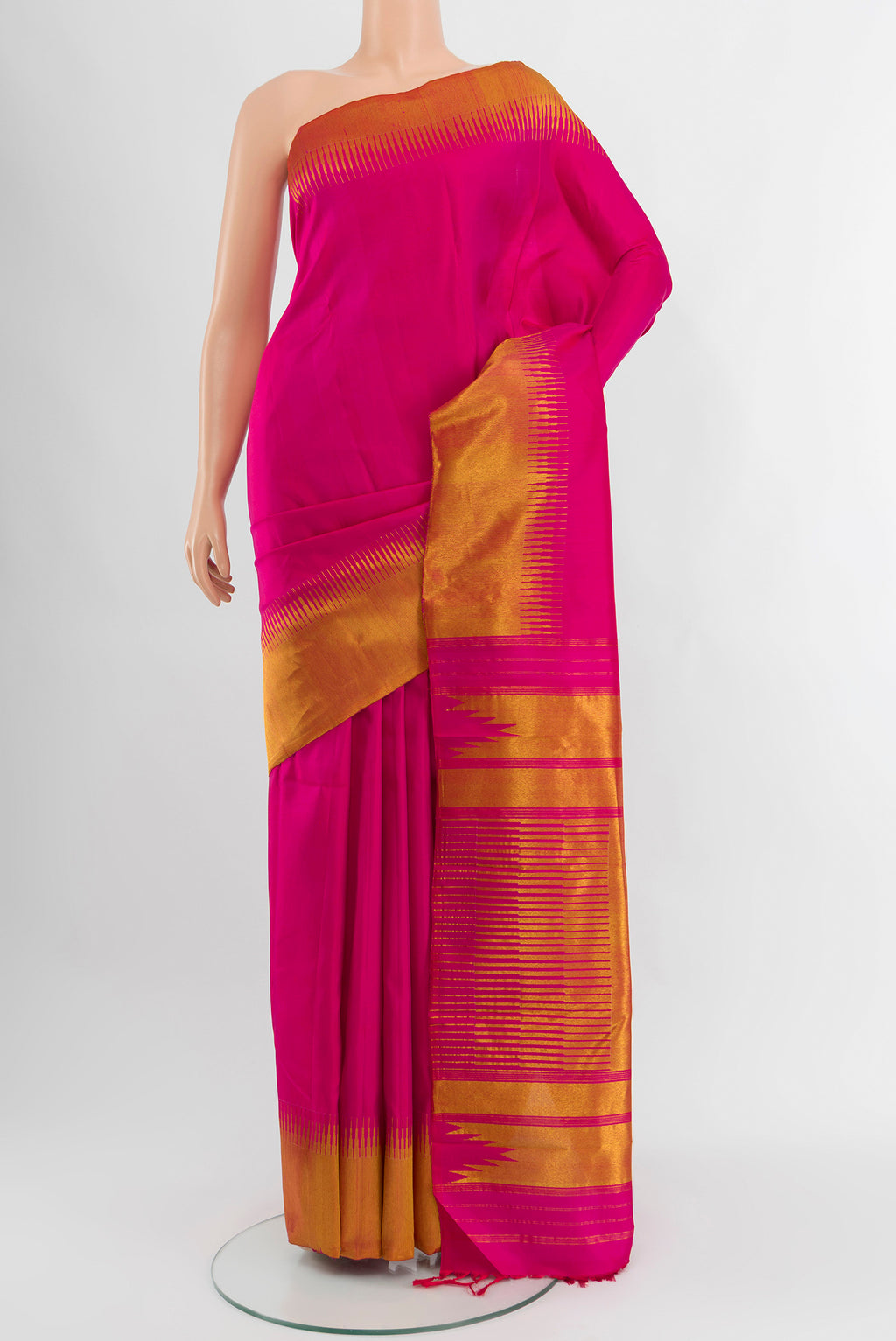 Pink Kanjivaram Silk Saree with Plain Body and Temple Border.  displayed on a mannequin