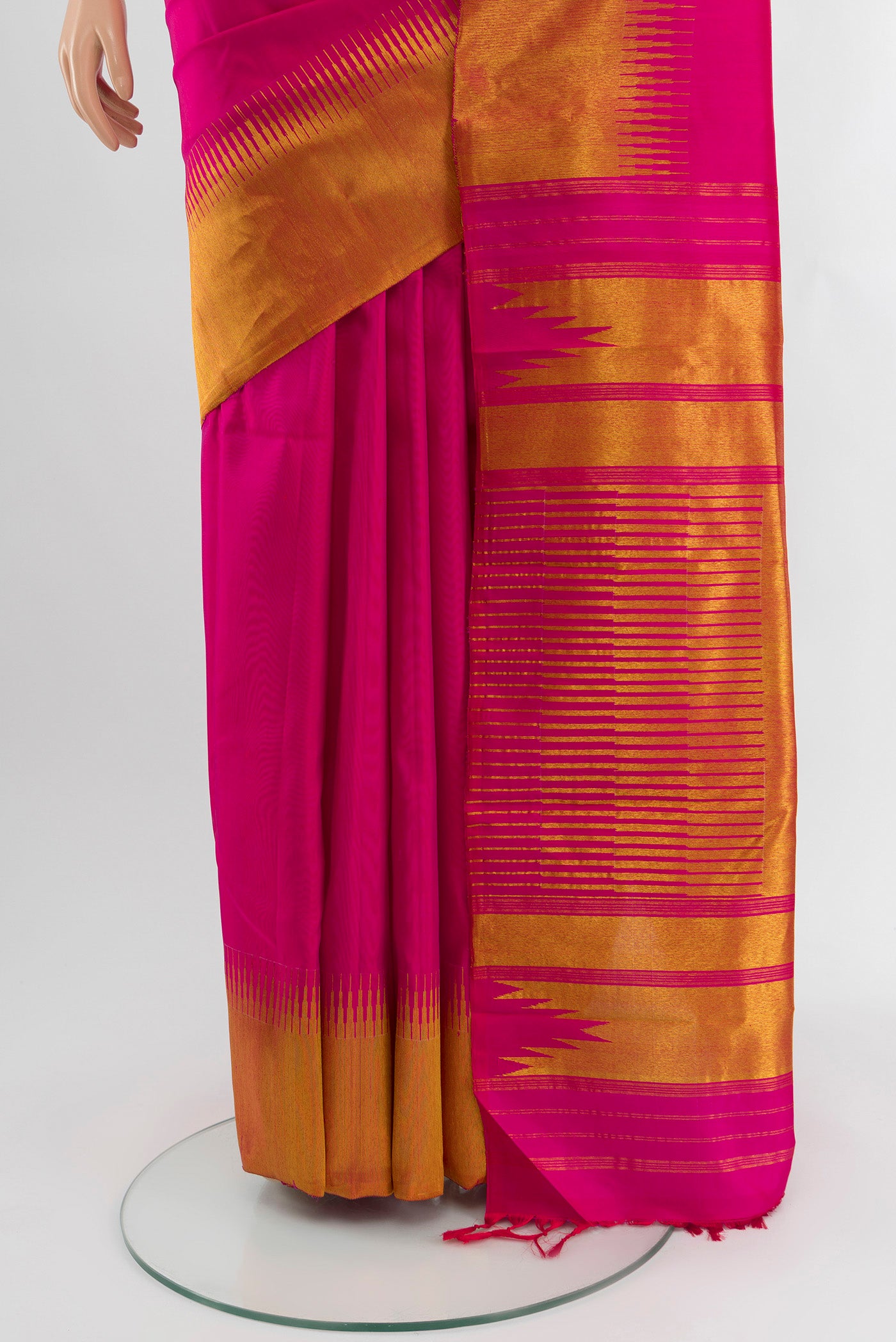 Pleats and pallu of Pink Kanjivaram Silk Saree with Plain Body and Temple Border. 