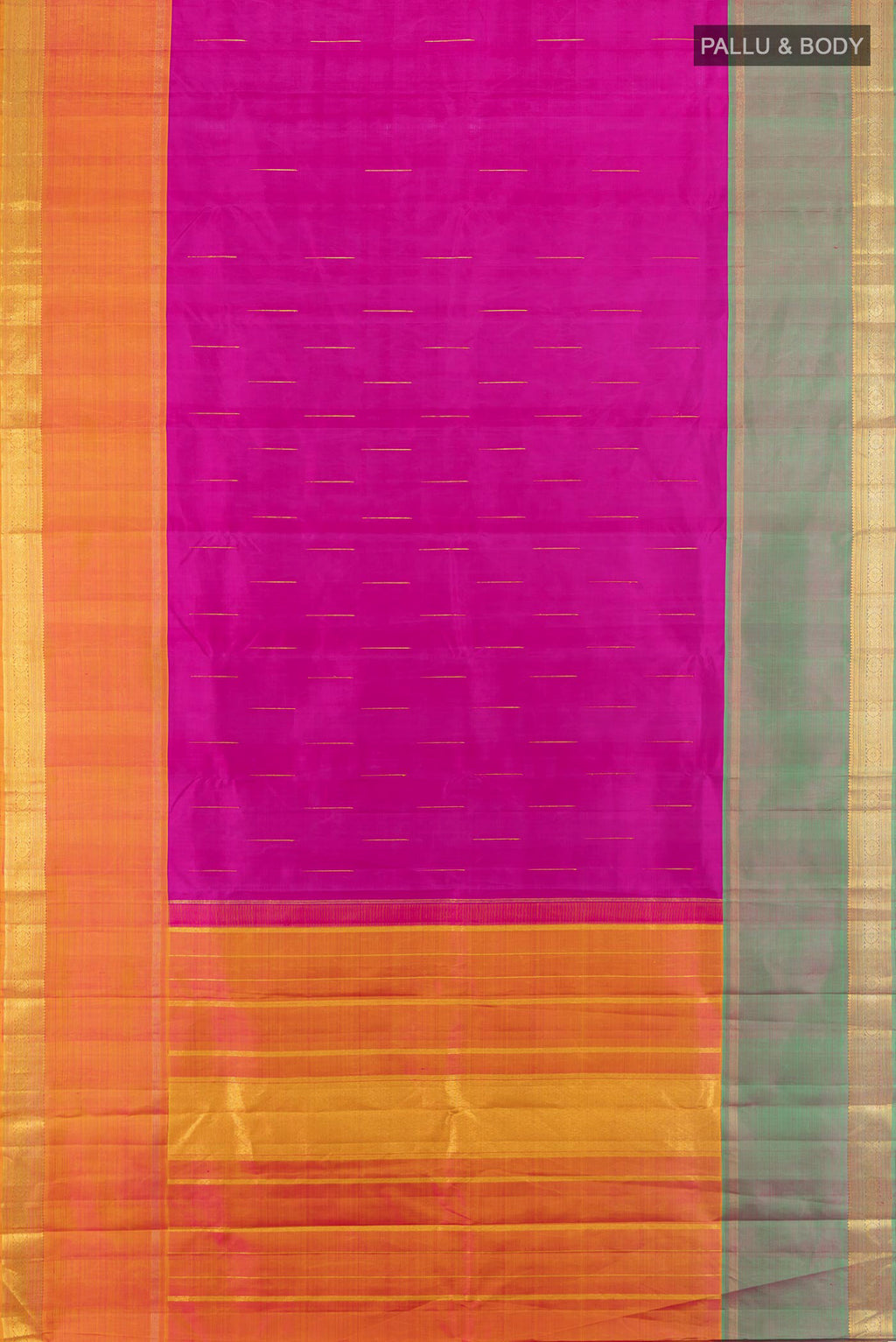 Flat view of Magenta Kanjivaram Silk Saree with Zari Butta on the body and Ganga Jamuna Border. 