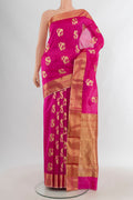 Rani Pink Chanderi Silk Saree with Zari Butta on the body and Zari Border.  displayed on a mannequin