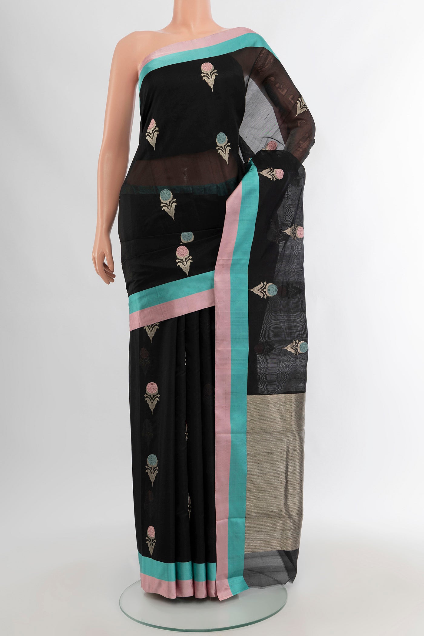 Black Chanderi Silk Cotton Saree with Zari Butta on the body and Plain Border.  displayed on a mannequin