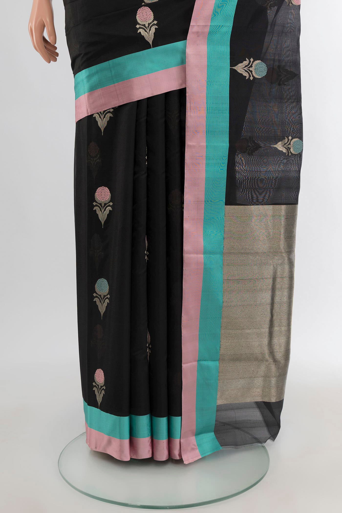 Pleats and pallu of Black Chanderi Silk Cotton Saree with Zari Butta on the body and Plain Border. 