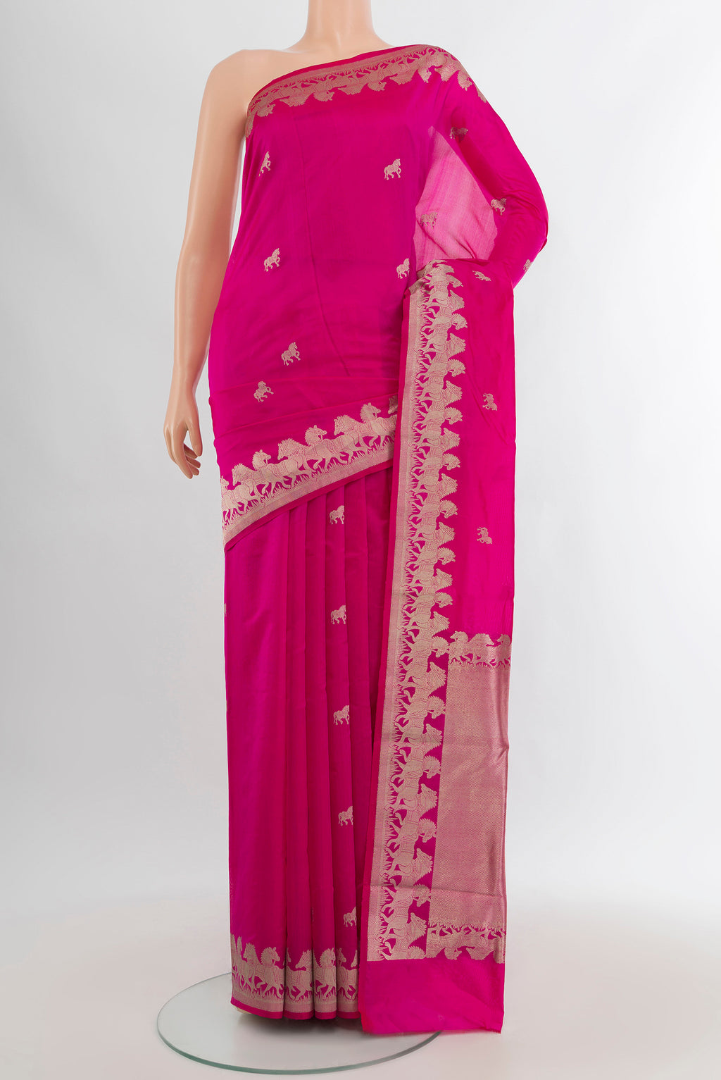 Rani Pink Banarasi Katan Silk Saree with Zari Butta on the body and Zari Border.  displayed on a mannequin