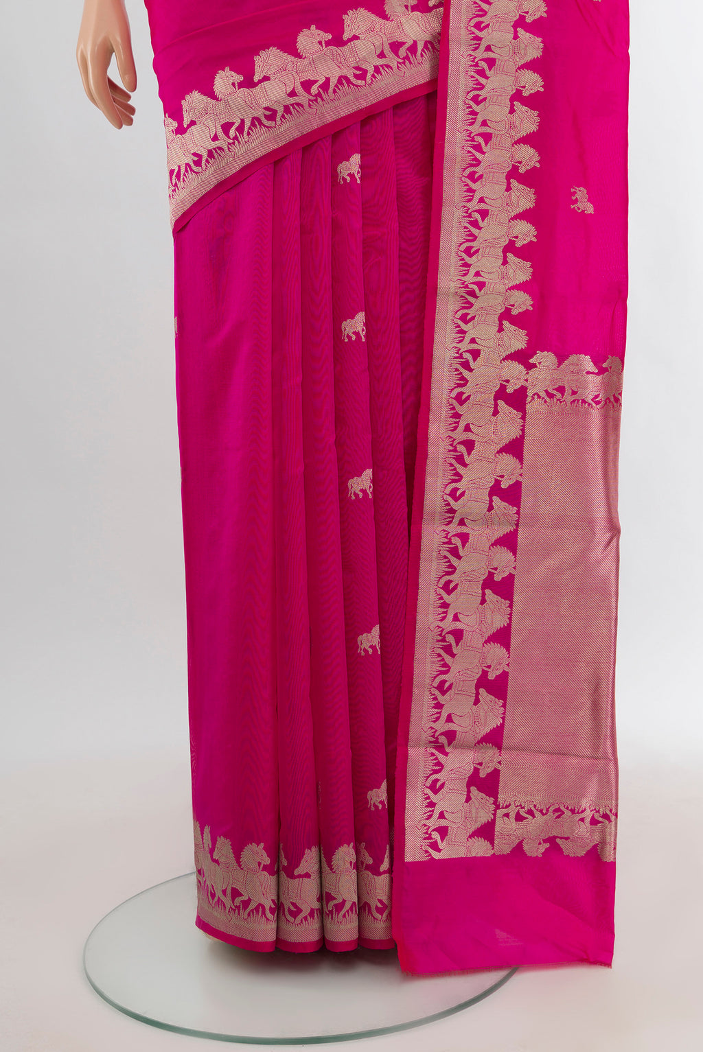 Pleats and pallu of Rani Pink Banarasi Katan Silk Saree with Zari Butta on the body and Zari Border. 