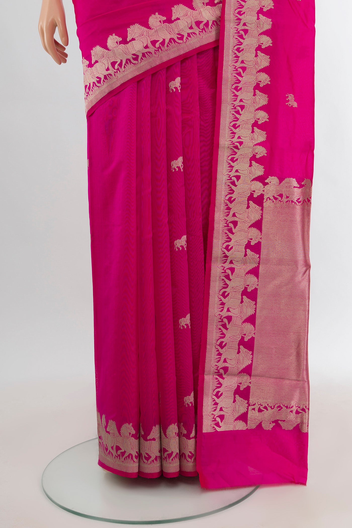 Pleats and pallu of Rani Pink Banarasi Katan Silk Saree with Zari Butta on the body and Zari Border. 