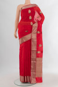 Red Chanderi Cotton Saree with Zari Butta on the body and Zari Border.  displayed on a mannequin