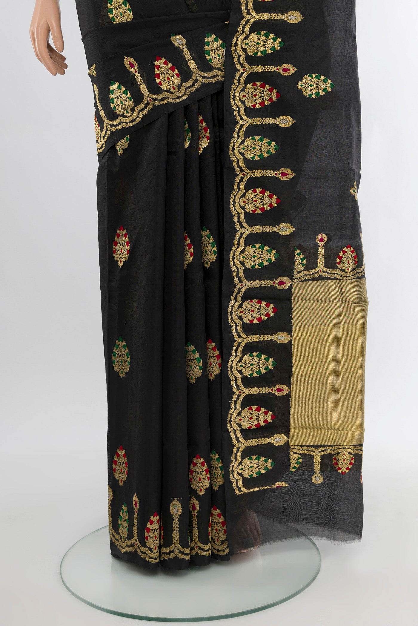 Pleats and pallu of Black Chanderi Silk Cotton Saree with Zari Butta on the body and Fancy Border. 