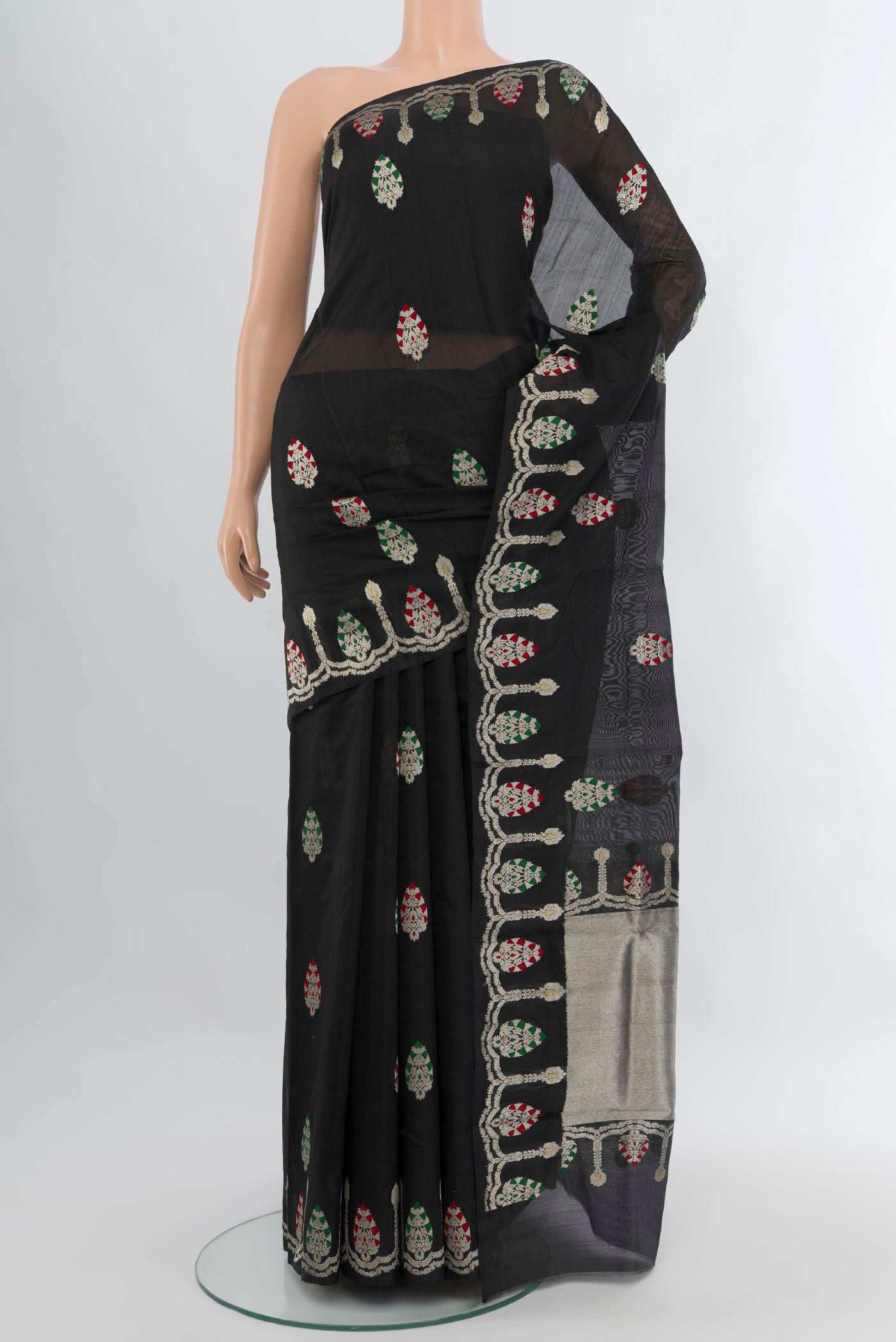 Black Chanderi Silk Saree with Zari Butta on the body and Fancy Border.  displayed on a mannequin