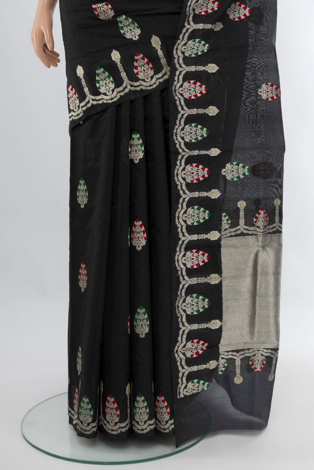 Pleats and pallu of Black Chanderi Silk Saree with Zari Butta on the body and Fancy Border. 