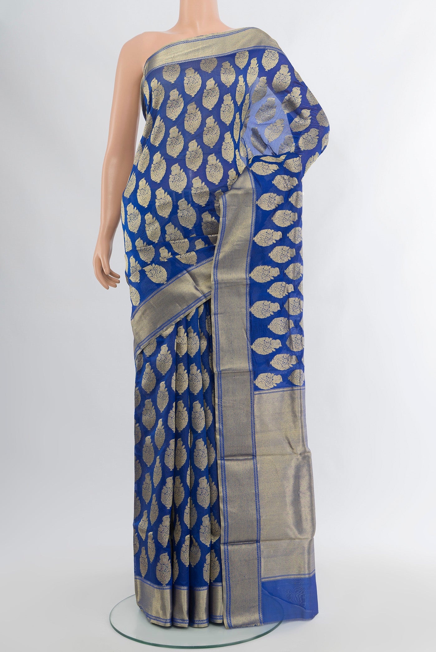 Royal Blue Chanderi Silk Cotton Saree with Zari Butta on the body and Zari Border.  displayed on a mannequin