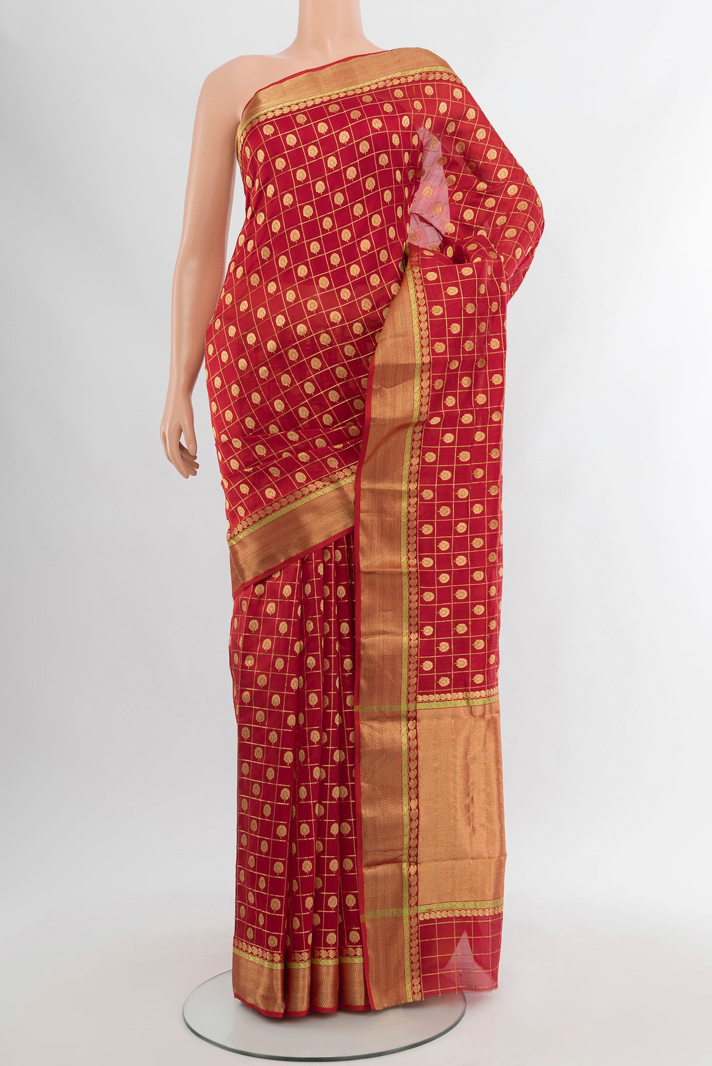 Red Chanderi Silk Cotton Saree with Checked design on the body and Zari Border.  displayed on a mannequin
