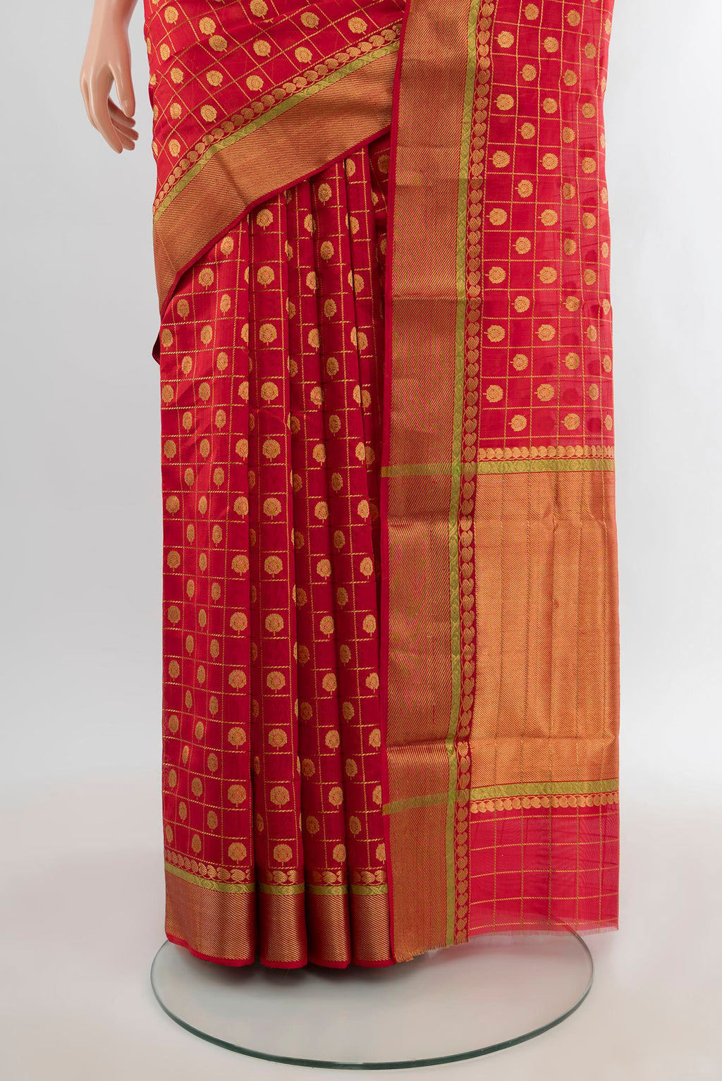 Pleats and pallu of Red Chanderi Silk Saree with Checked design on the body and Zari Border. 