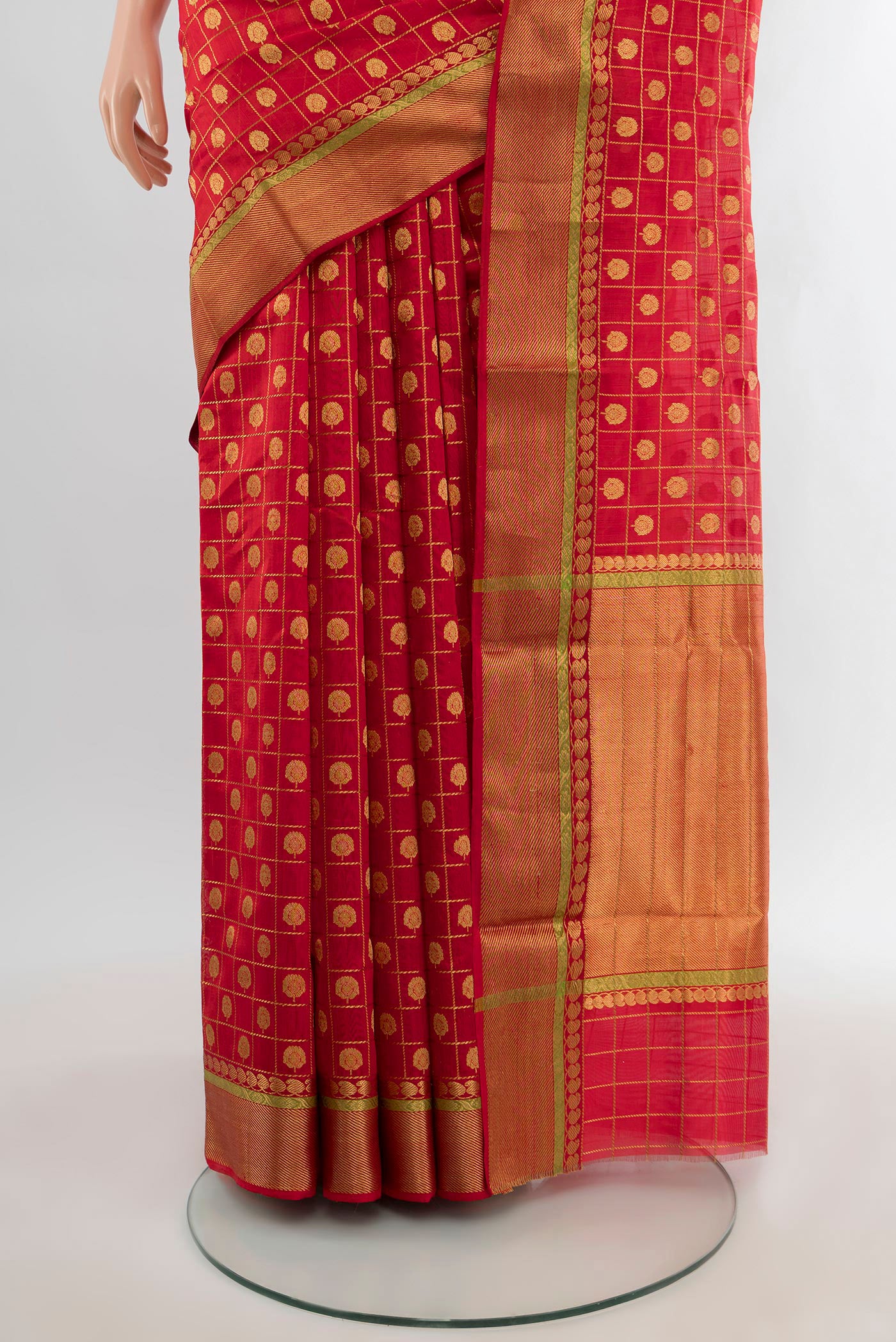 Pleats and pallu of Red Chanderi Silk Saree with Checked design on the body and Zari Border. 
