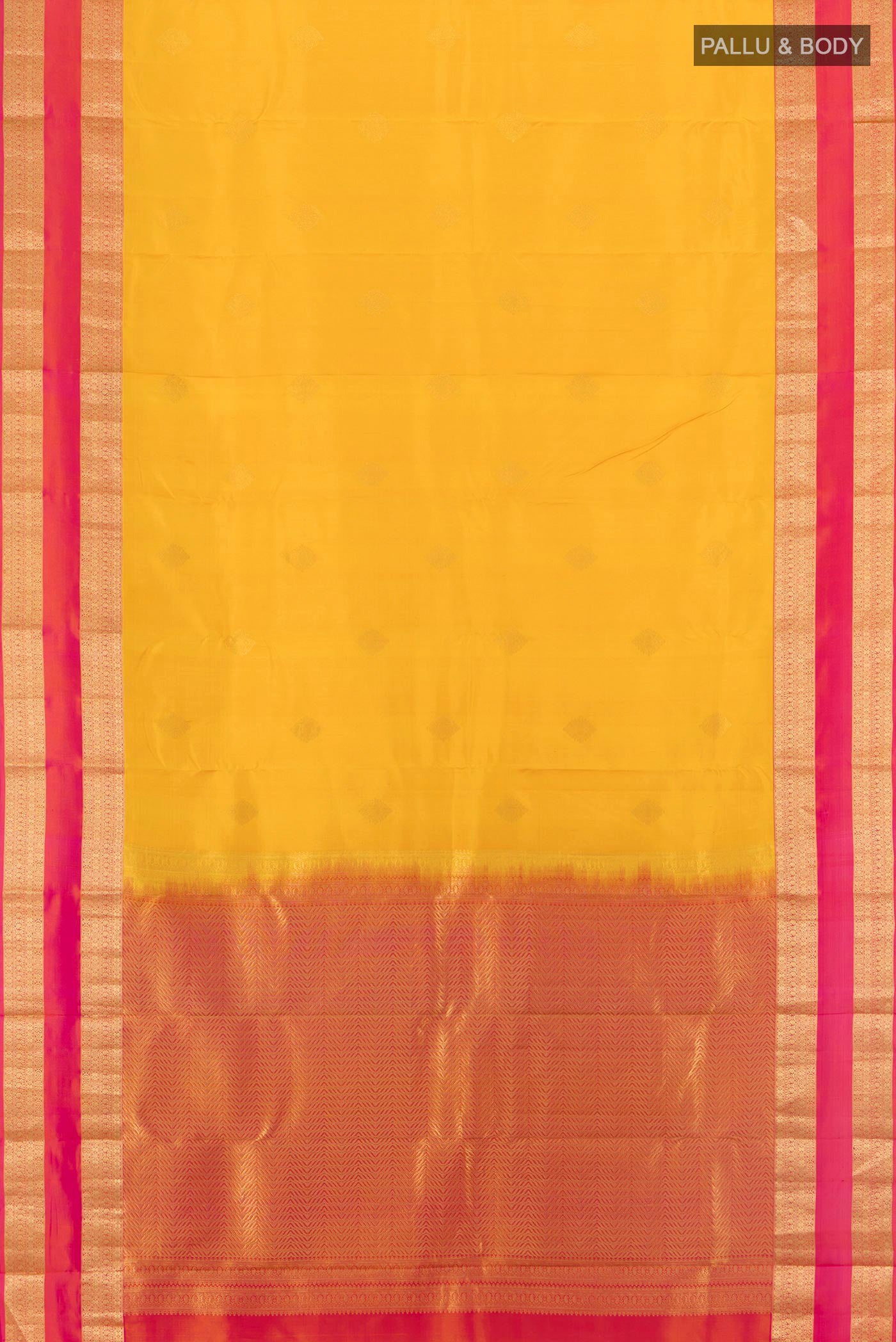 Flat view of Mustard Kanchipuram Silk Saree with Zari Butta on the body and Zari Border. 