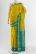 Mehandi Green Kanchipuram Silk Saree with Zari Butta on the body and Zari Border.  displayed on a mannequin