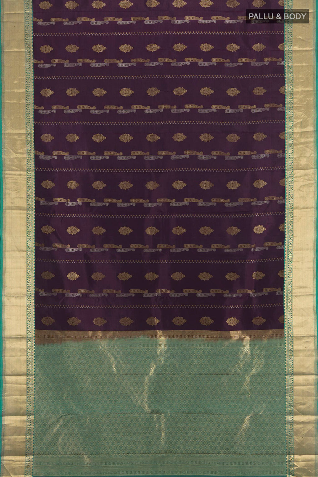 Flat view of Purple Kanjivaram Silk Saree with Zari Butta on the body and Zari Border. 