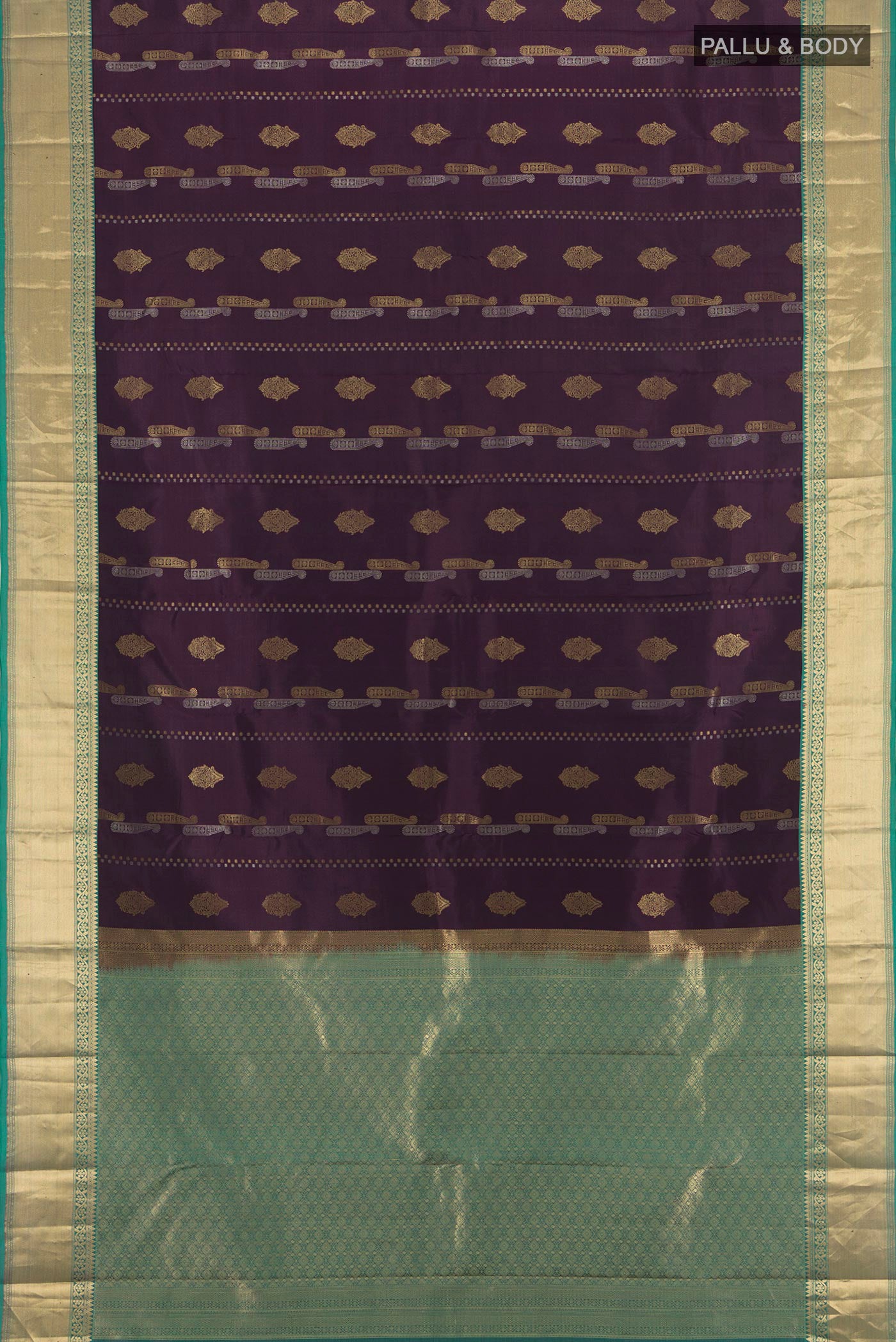 Flat view of Purple Kanjivaram Silk Saree with Zari Butta on the body and Zari Border. 