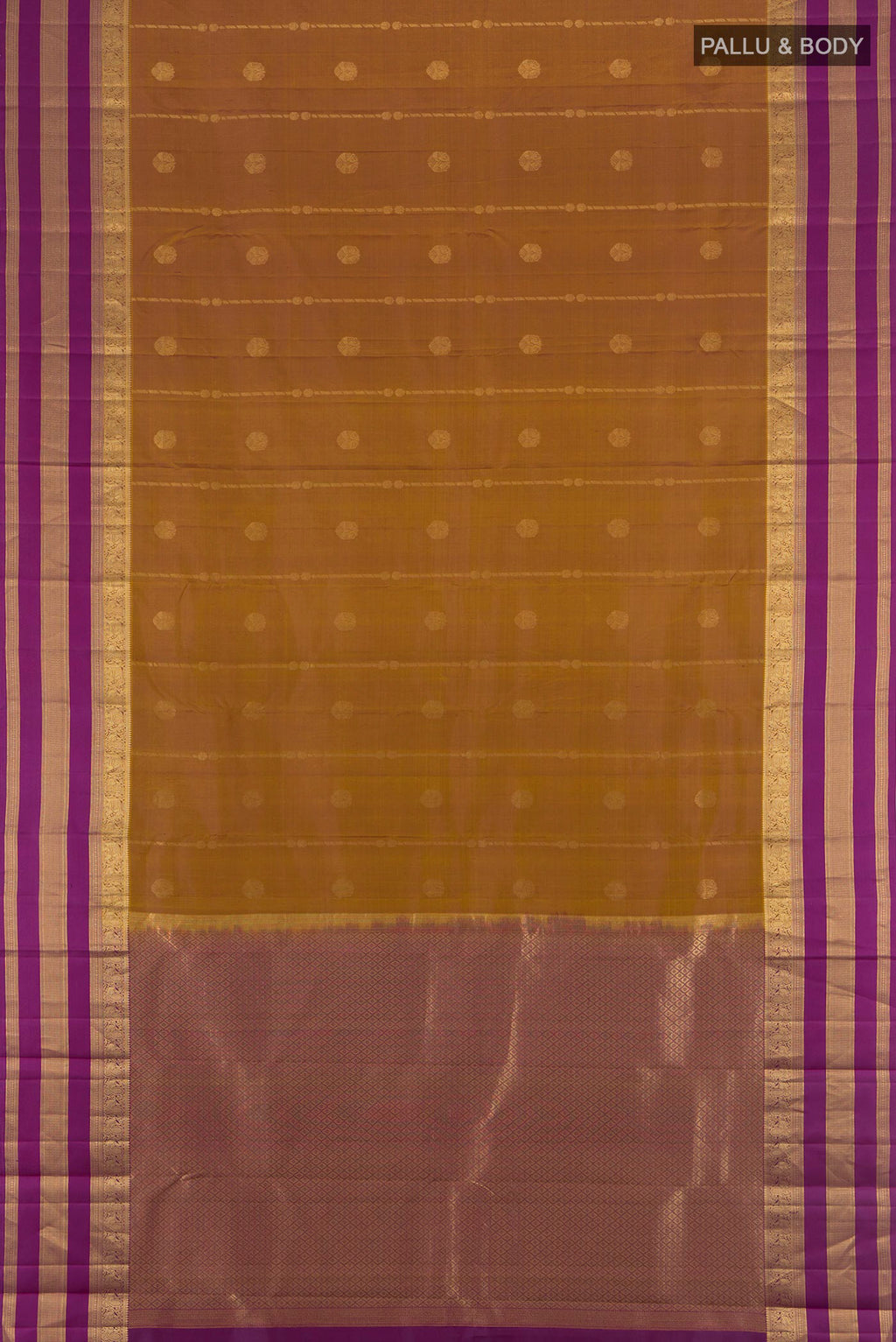 Flat view of Brown Kanchipuram Silk Saree with Zari Butta on the body and Zari Border. 