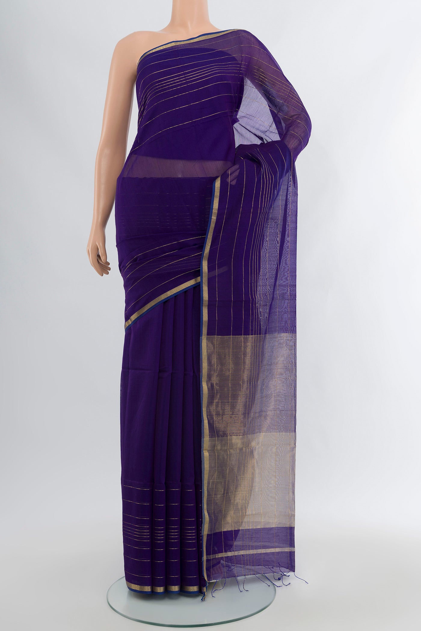Royal Blue Maheshwari Silk Cotton Saree with Plain Body and Zari Border.  displayed on a mannequin