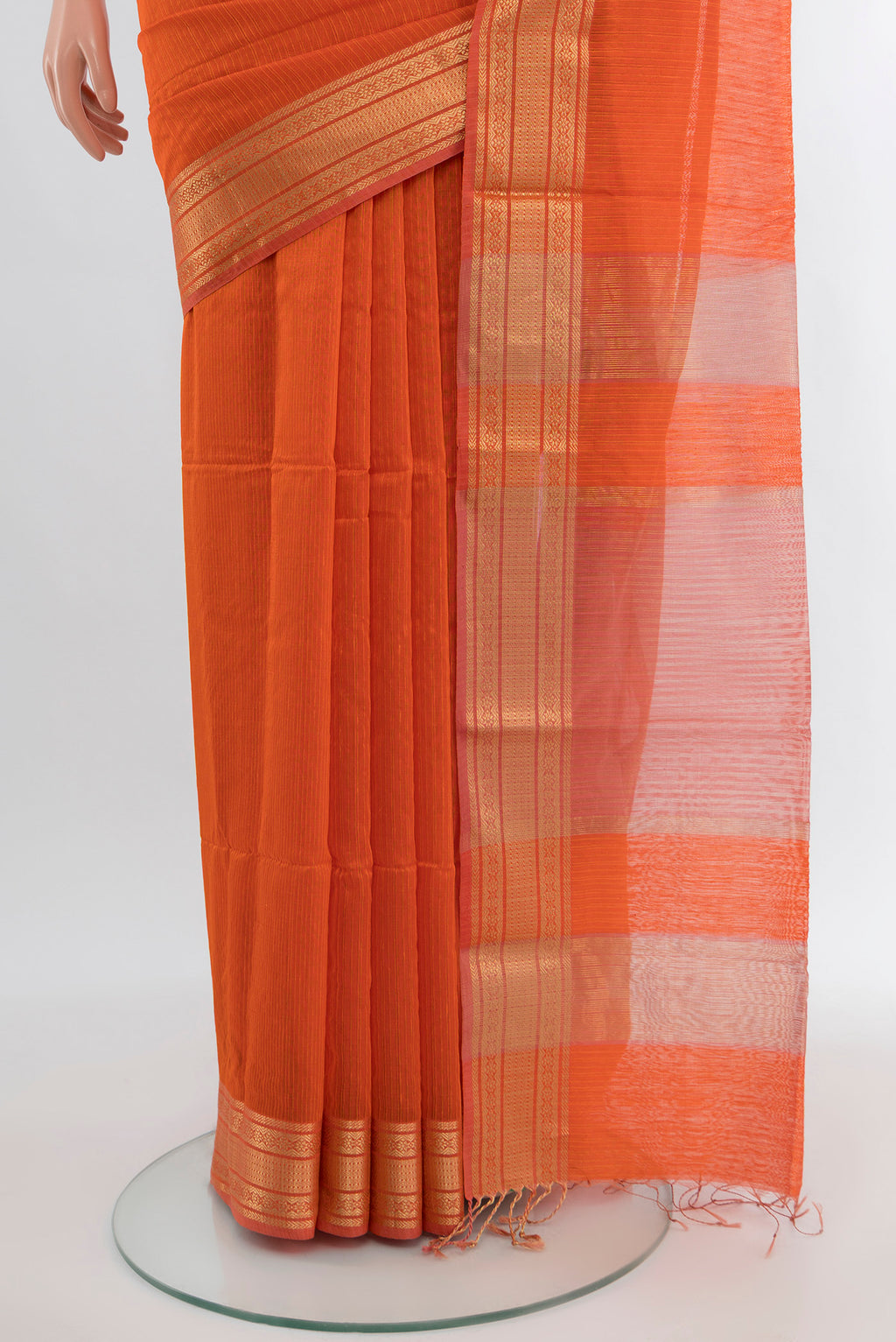 Pleats and pallu of Orange Maheshwari Silk Cotton Saree with Stripes on the body and Zari Border. 