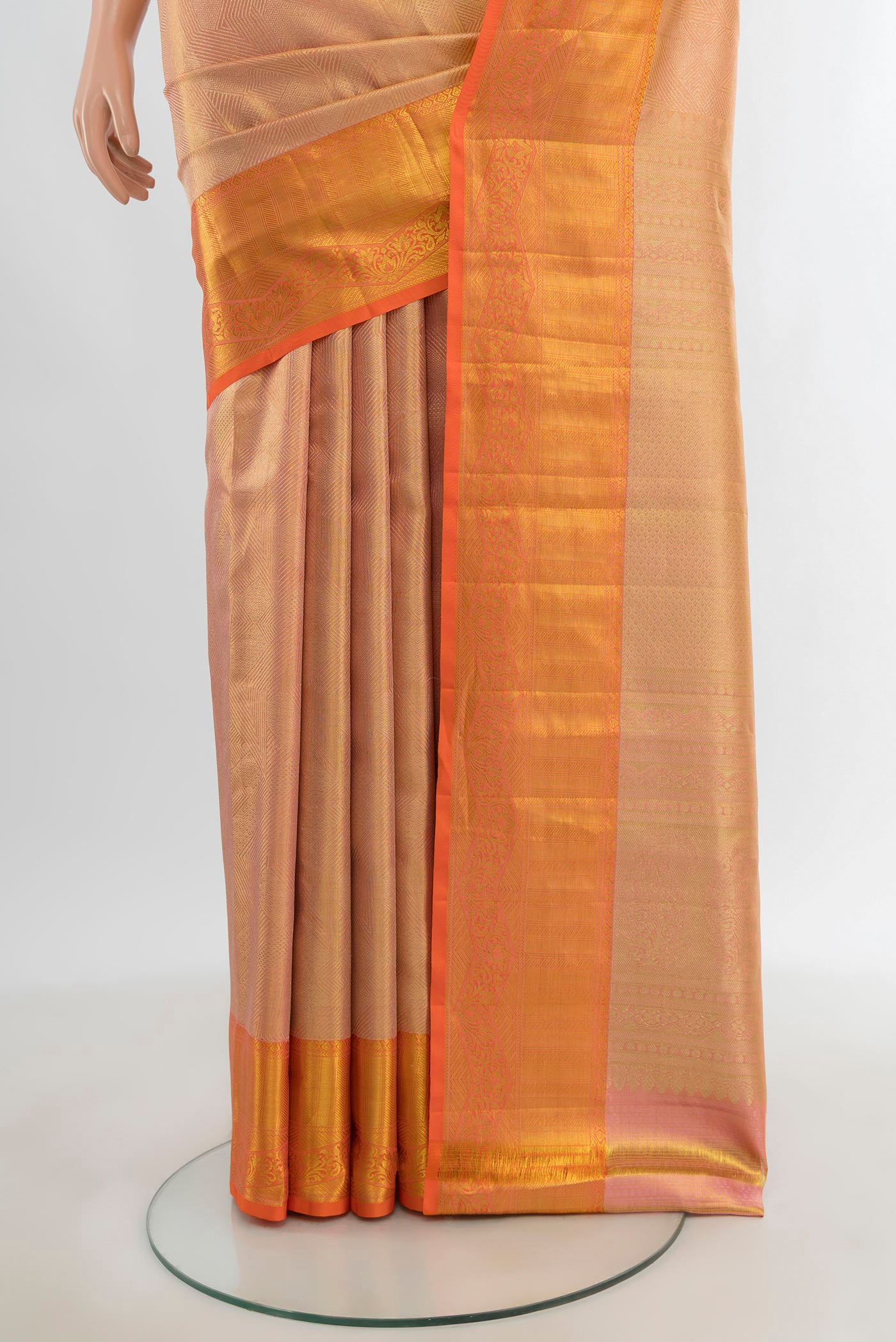 Pleats and pallu of Golden Peach Kanchipuram Tissue Silk Saree with Zari Brocade on the body and Zari Border. 
