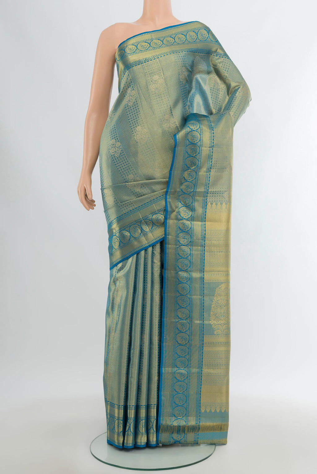 Light Blue Kanchipuram Silk Saree with Zari Brocade on the body and Zari Border.  displayed on a mannequin